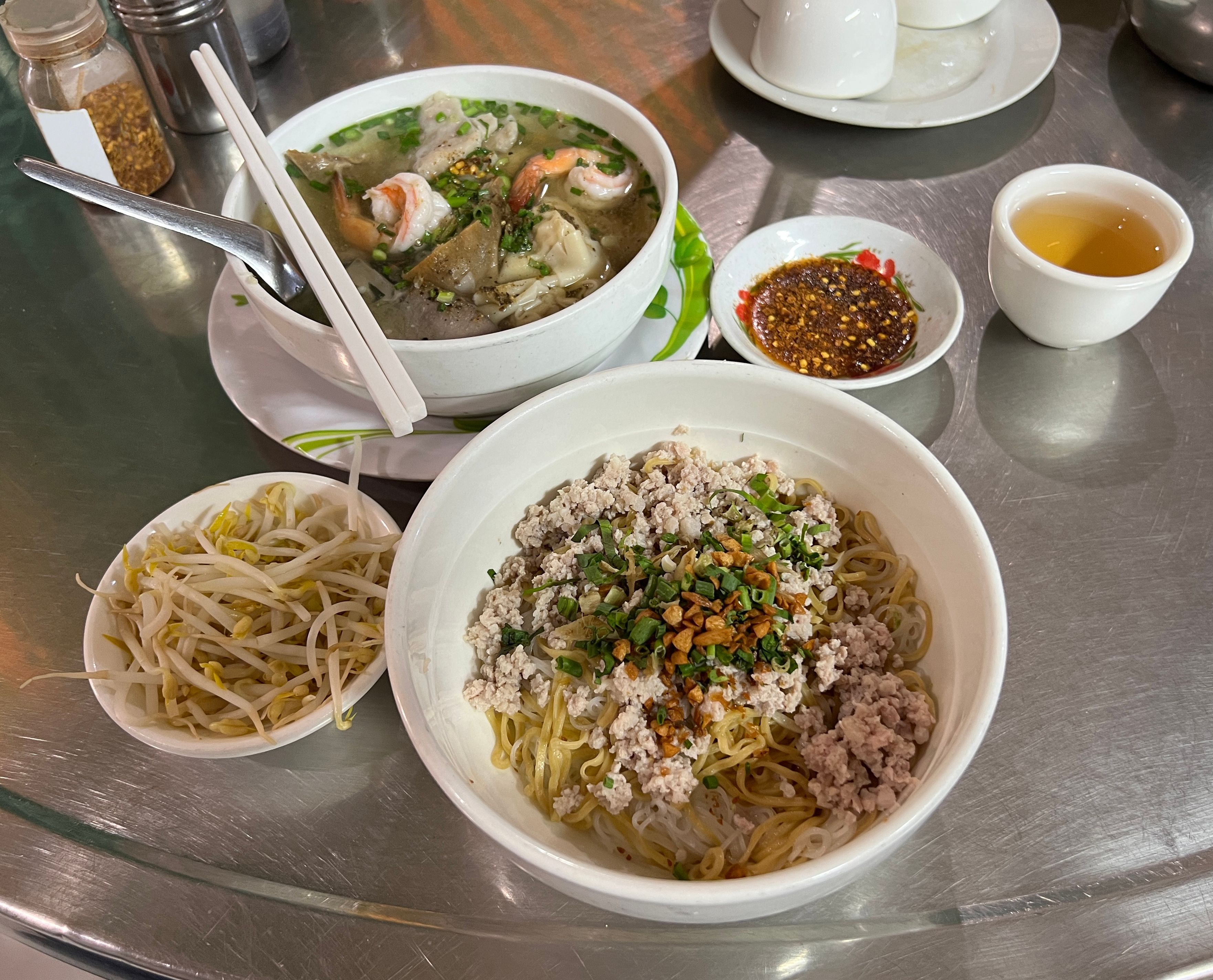 Dry egg noodles with minced pork and soup with pork offal and shrimp Dry egg noodles with minced pork and soup with pork offal and shrimp