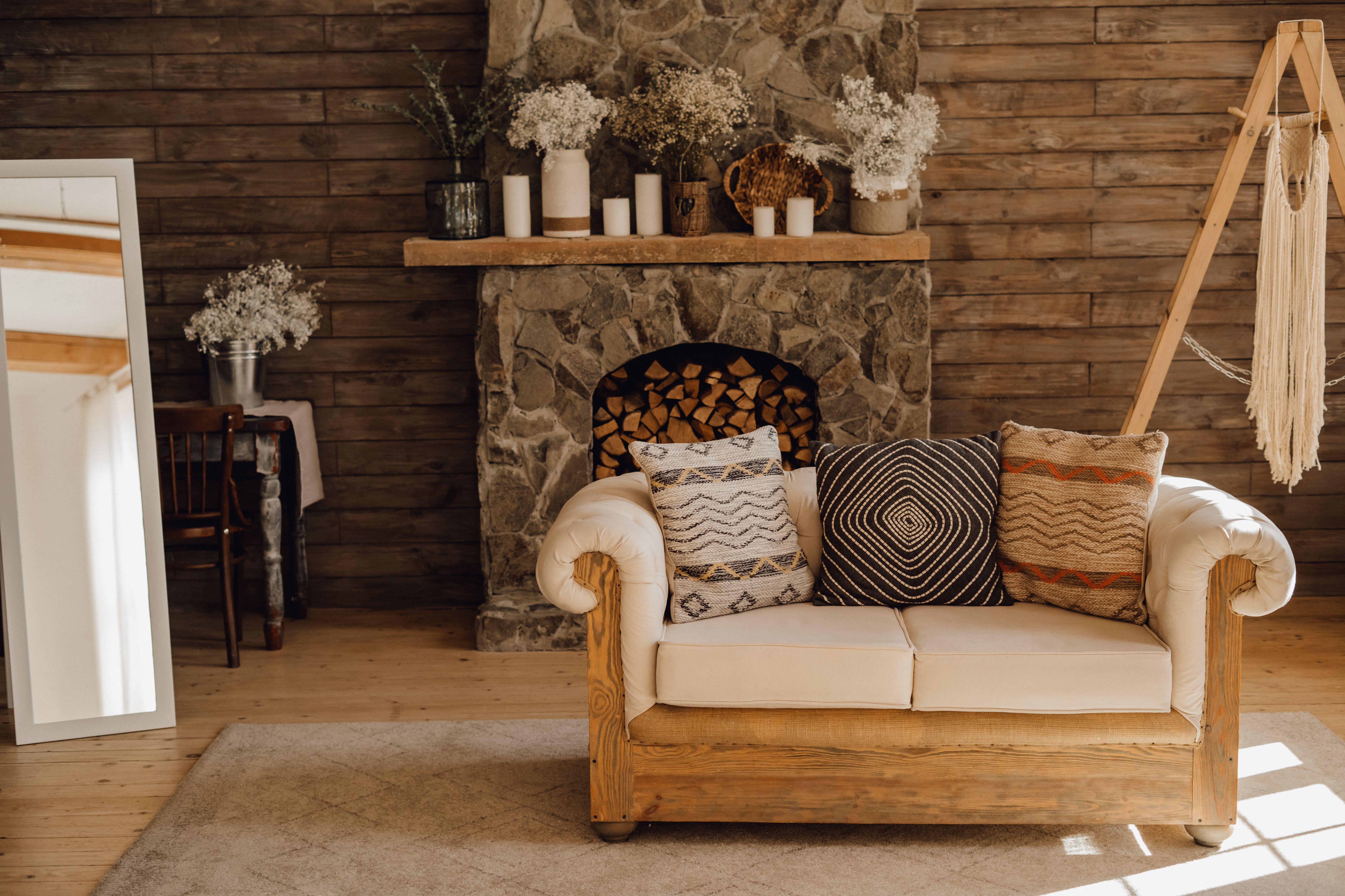 Chalet Cozy Interior Wooden Sofa and Fireplace