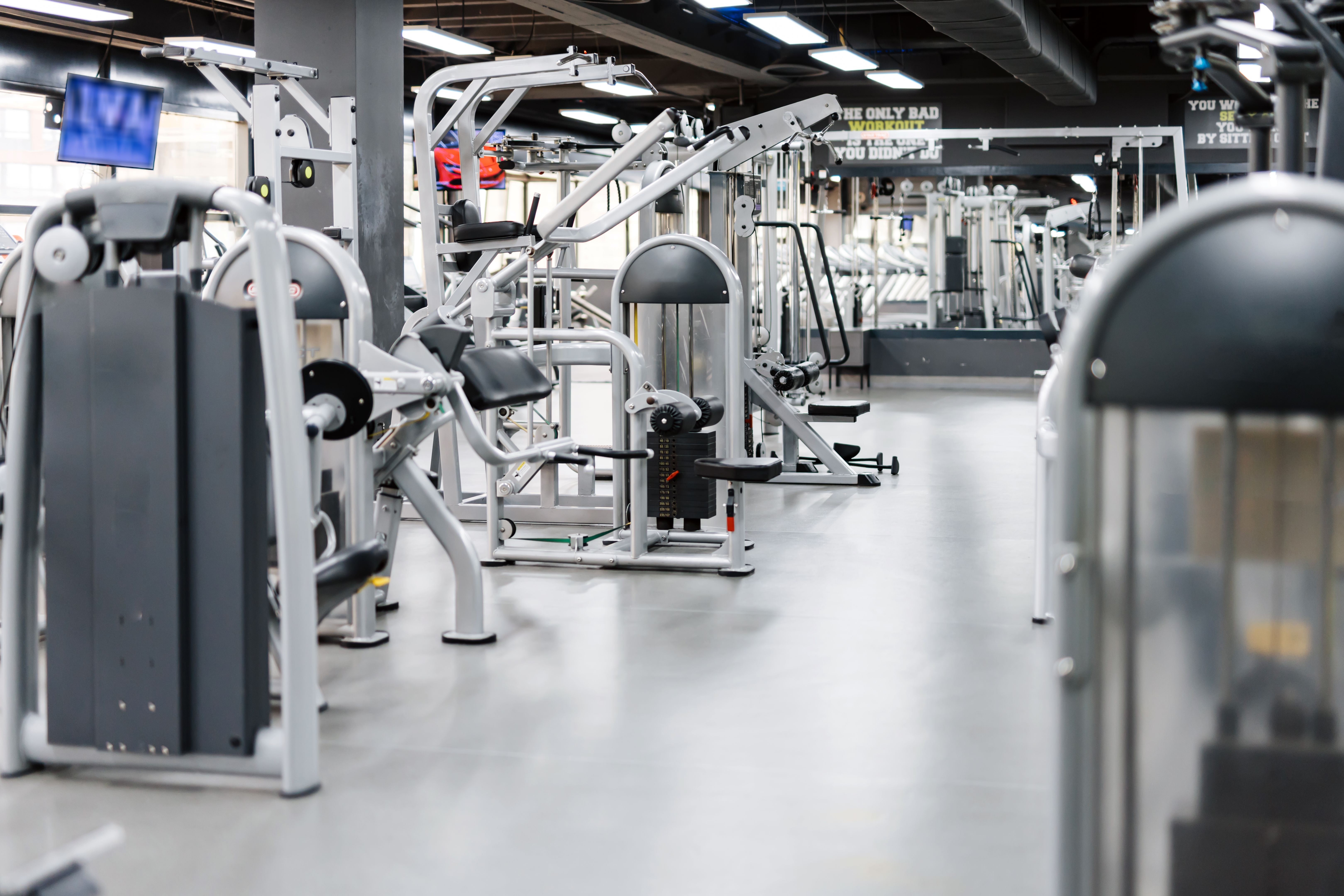 Empty gym with various exercise machines