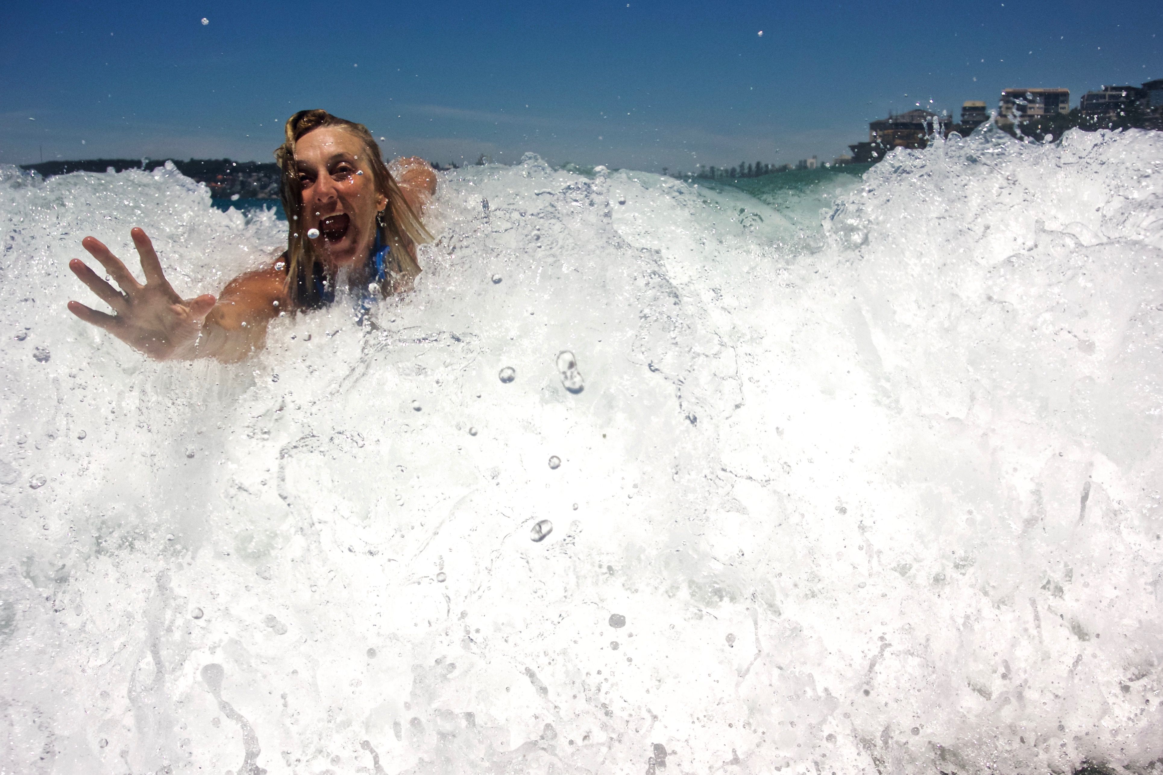 Mature woman body surfing
