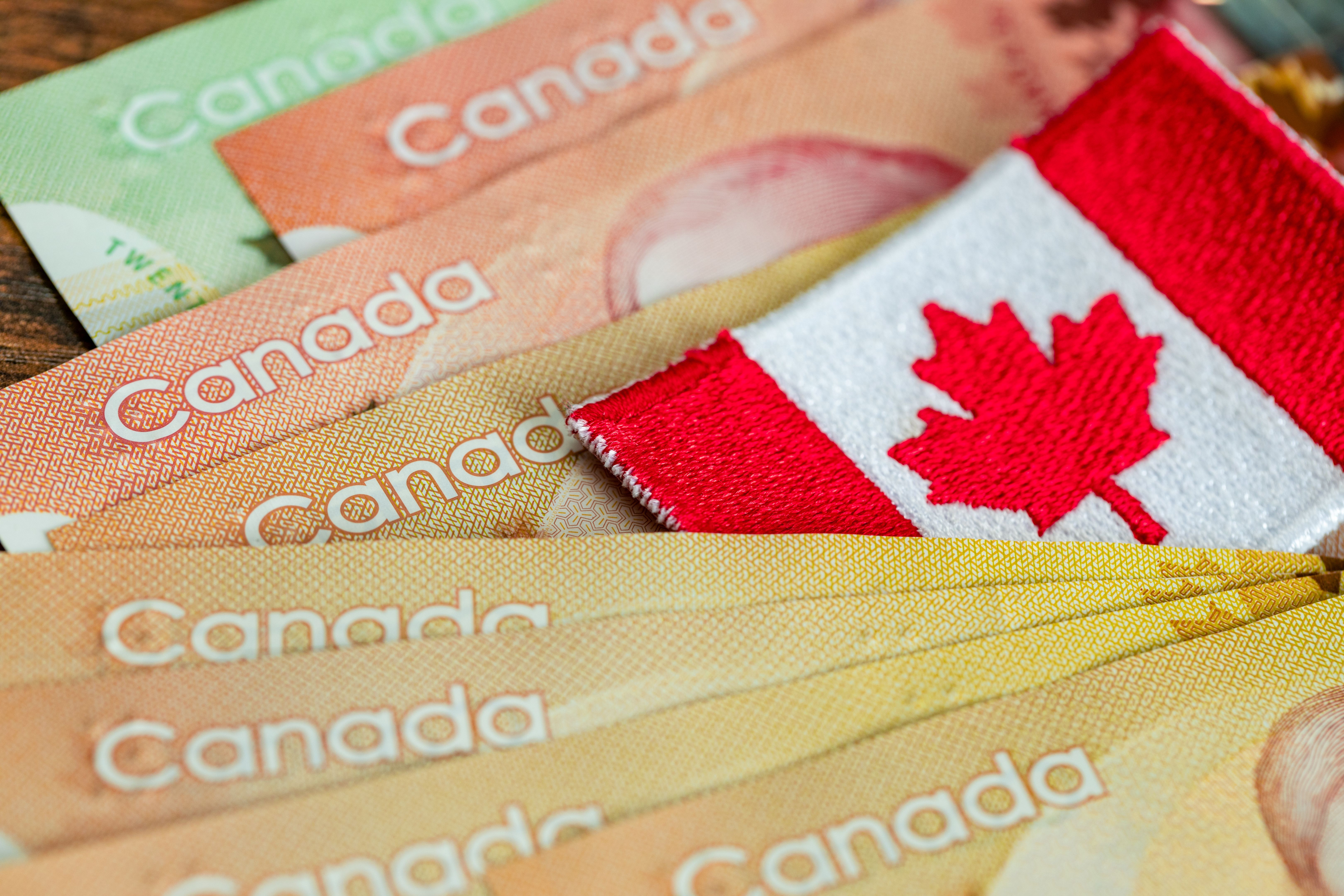 Canada finance. Financial business concept. Canadian dollars and flag