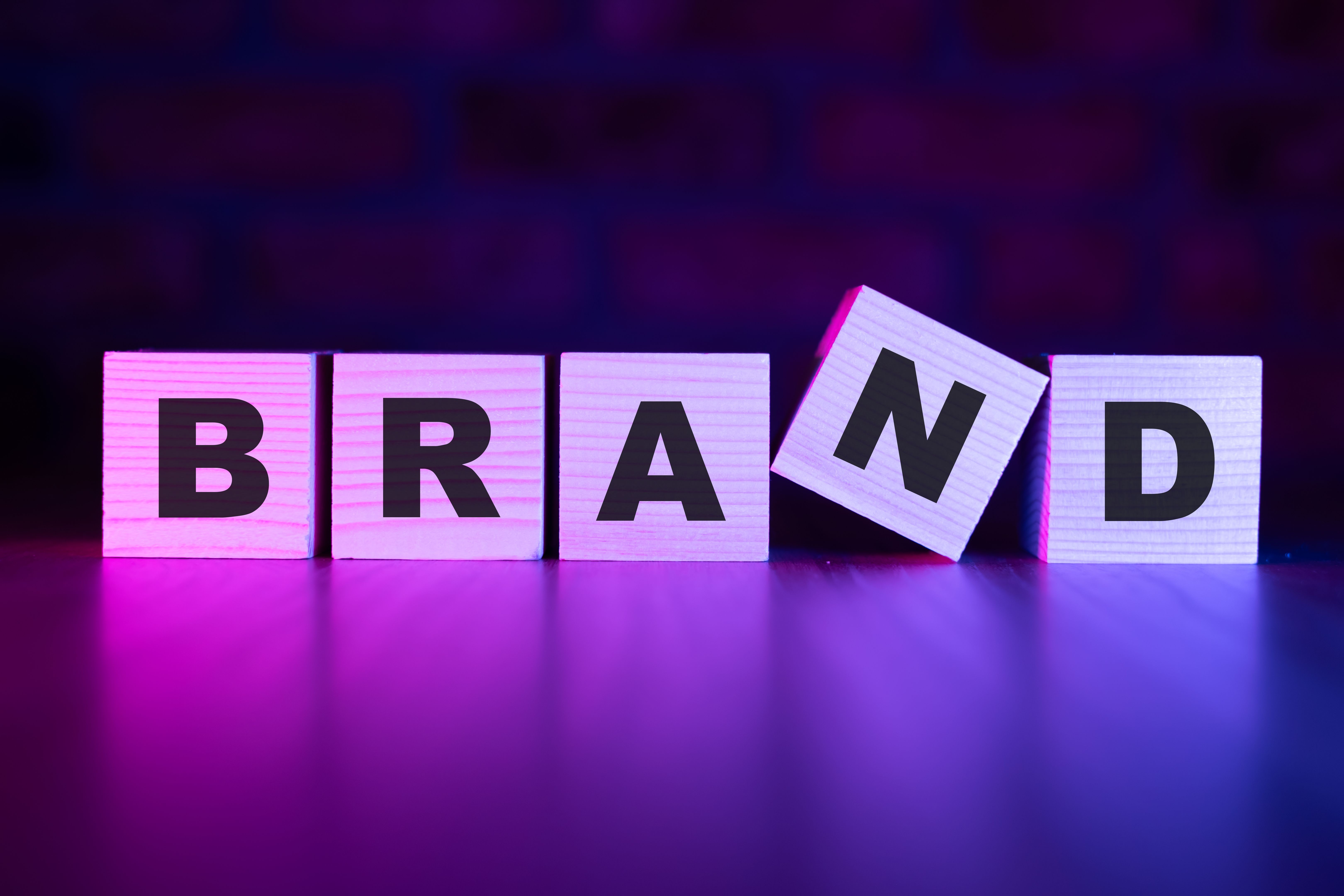 Brand word with wooden blocks on table Brand word with wooden blocks on table