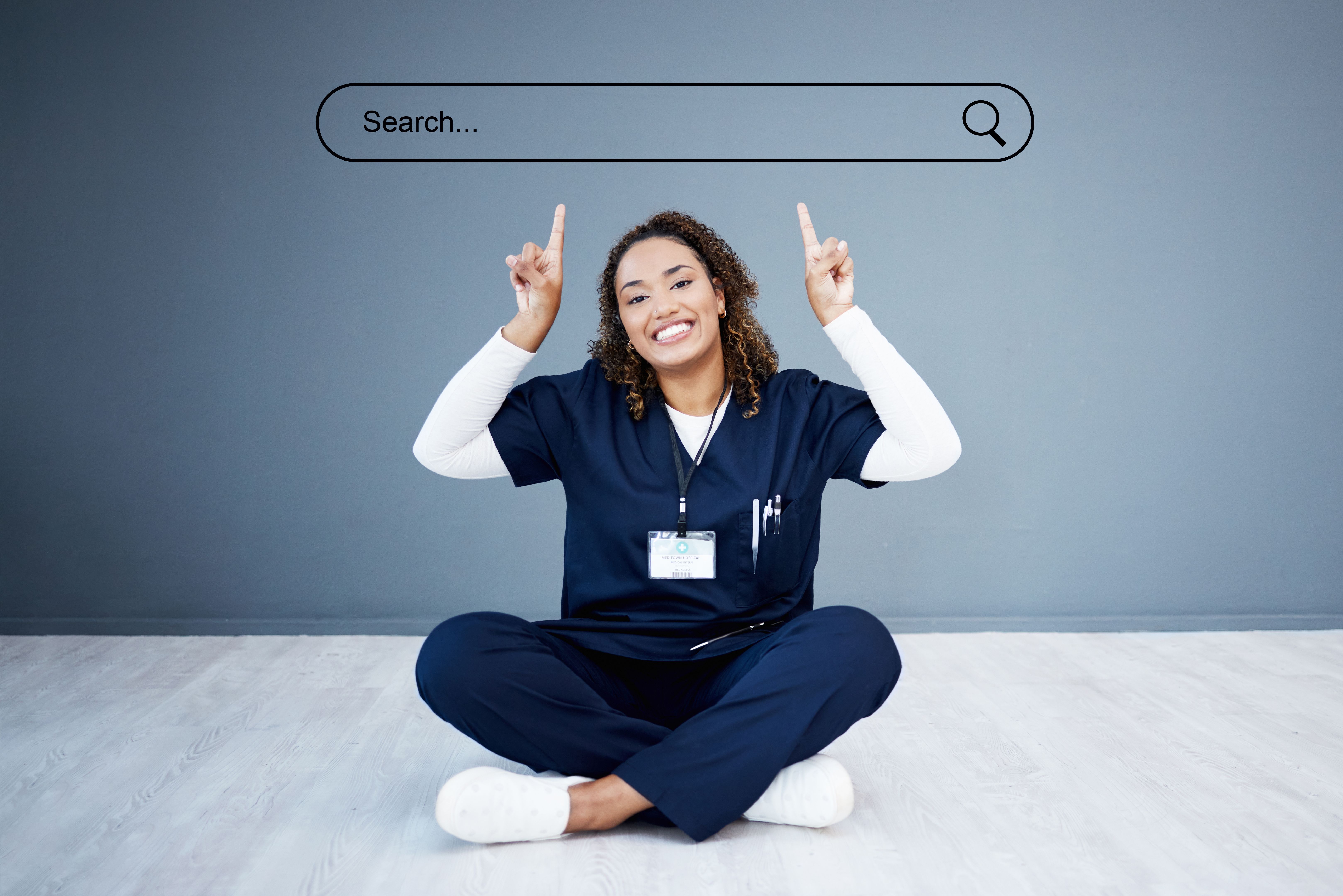 Portrait, woman and nurse with hologram and search bar and pointing on gray background. Face, person on floor and medical with professional, hand gesture and animation for information and about us