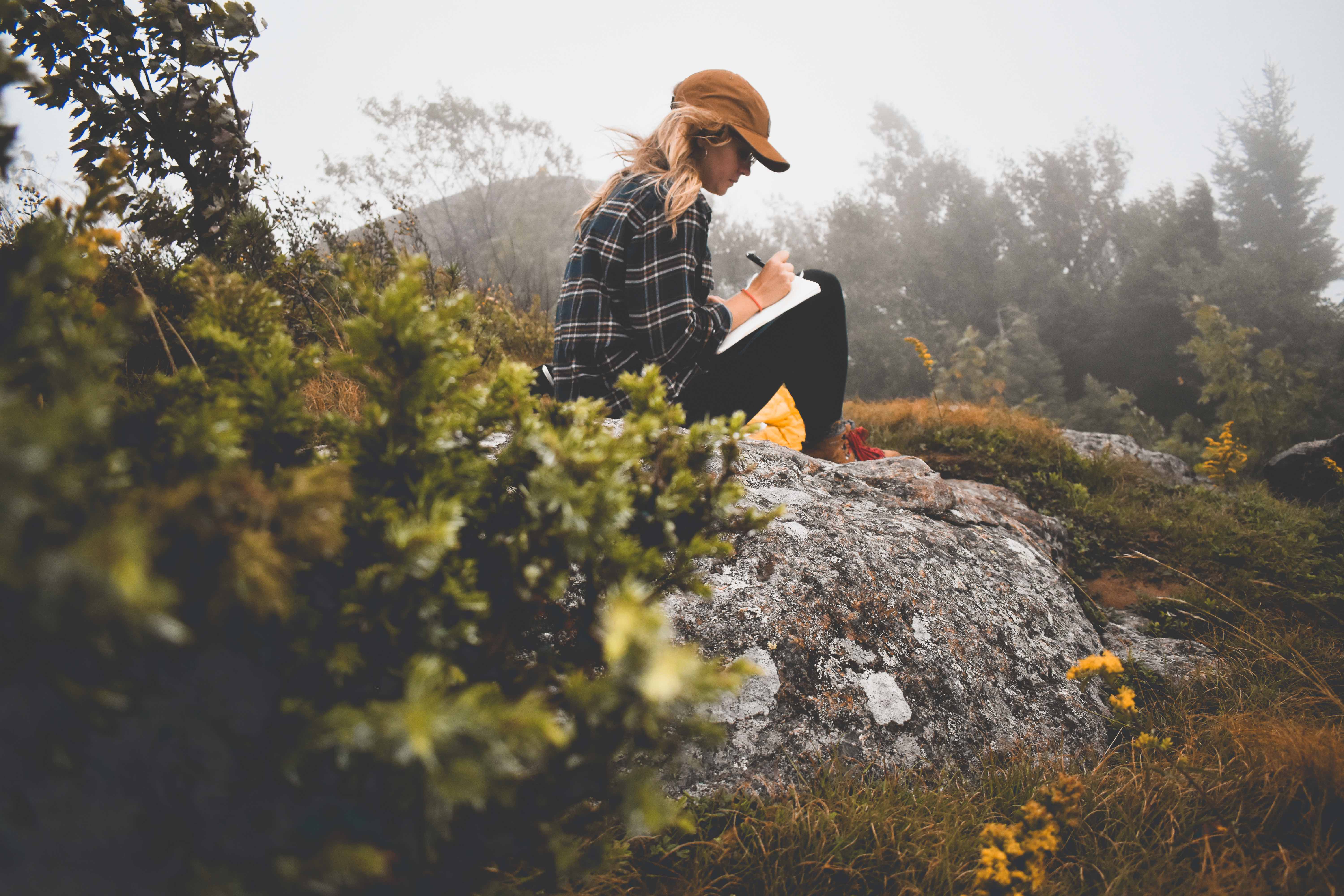 Woman Writing on a Mountain Woman Writing on a Mountain