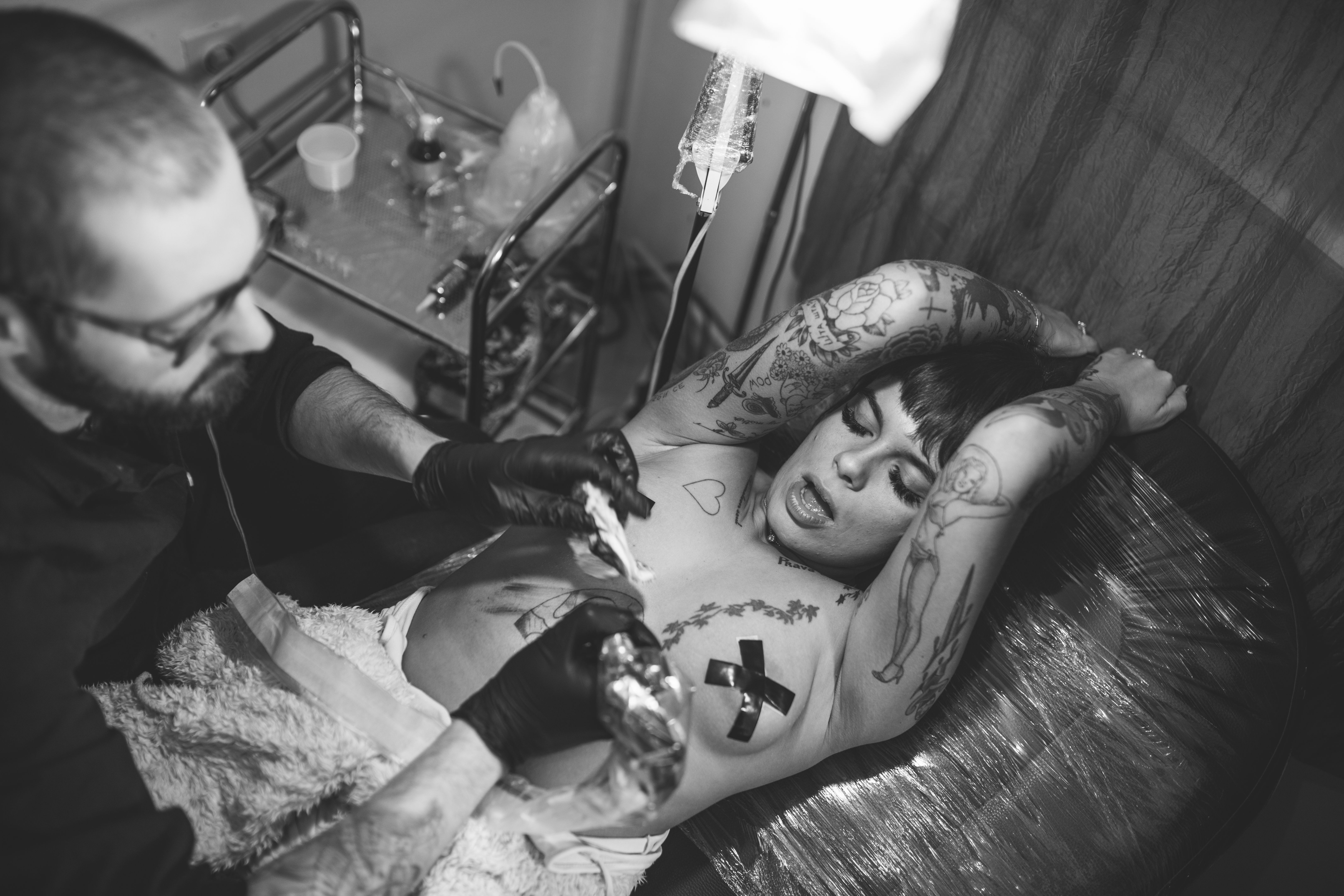 Girl enjoying in tattooing