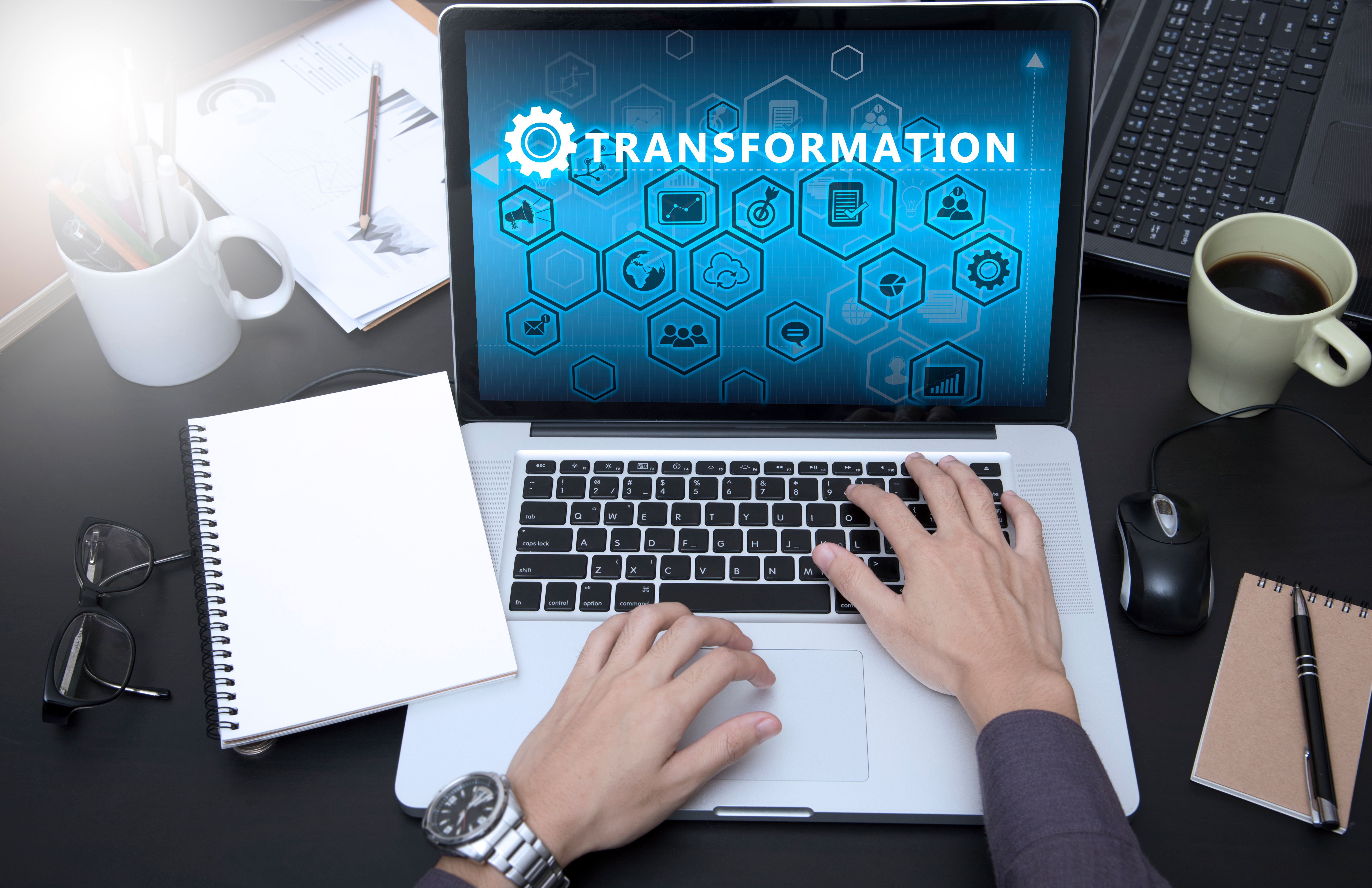 business hand typing on laptop keyboard with Web transformation homepage business hand typing on laptop keyboard with Web transformation homepage