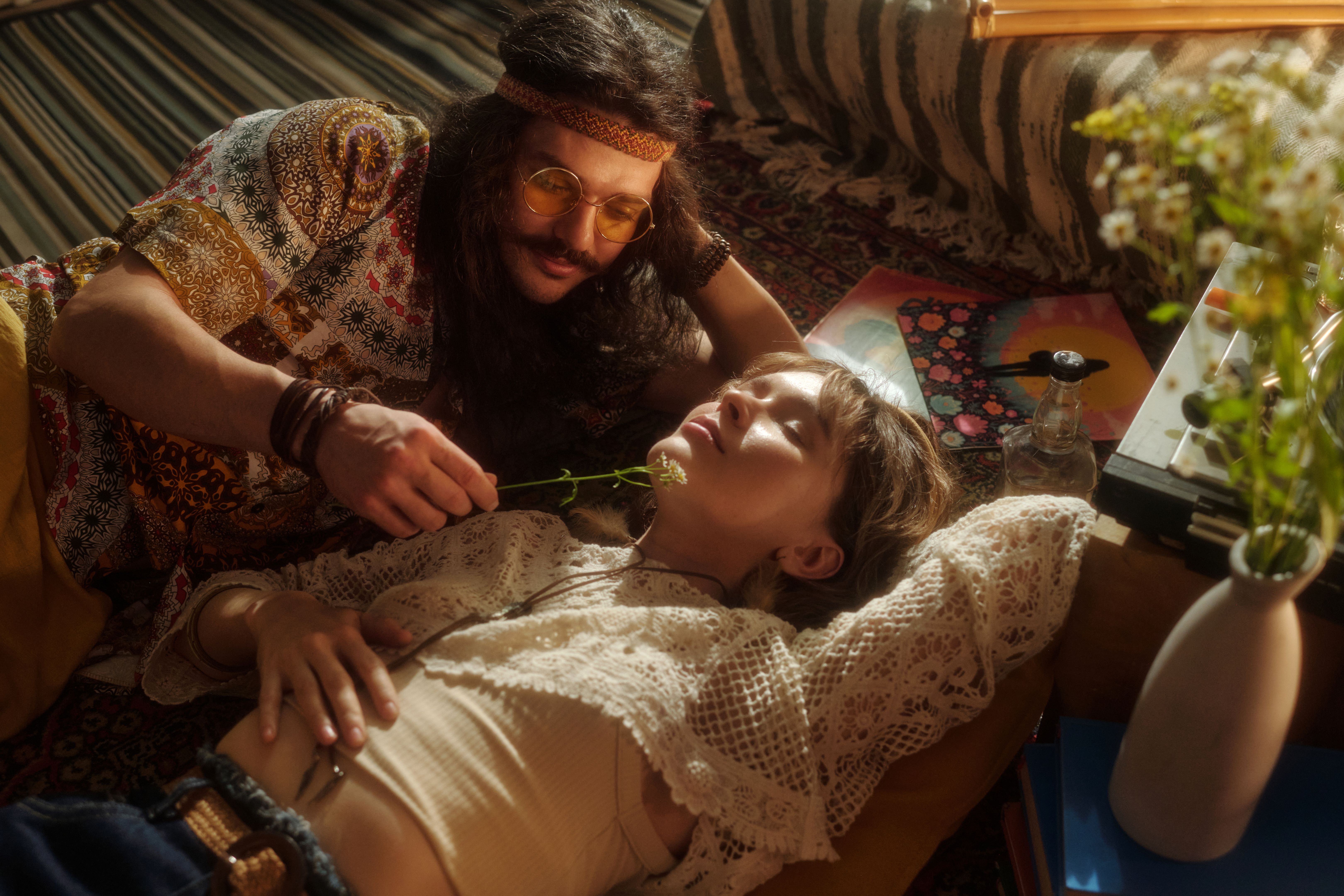 Man Providing Comfort to Woman Using Flower Therapy