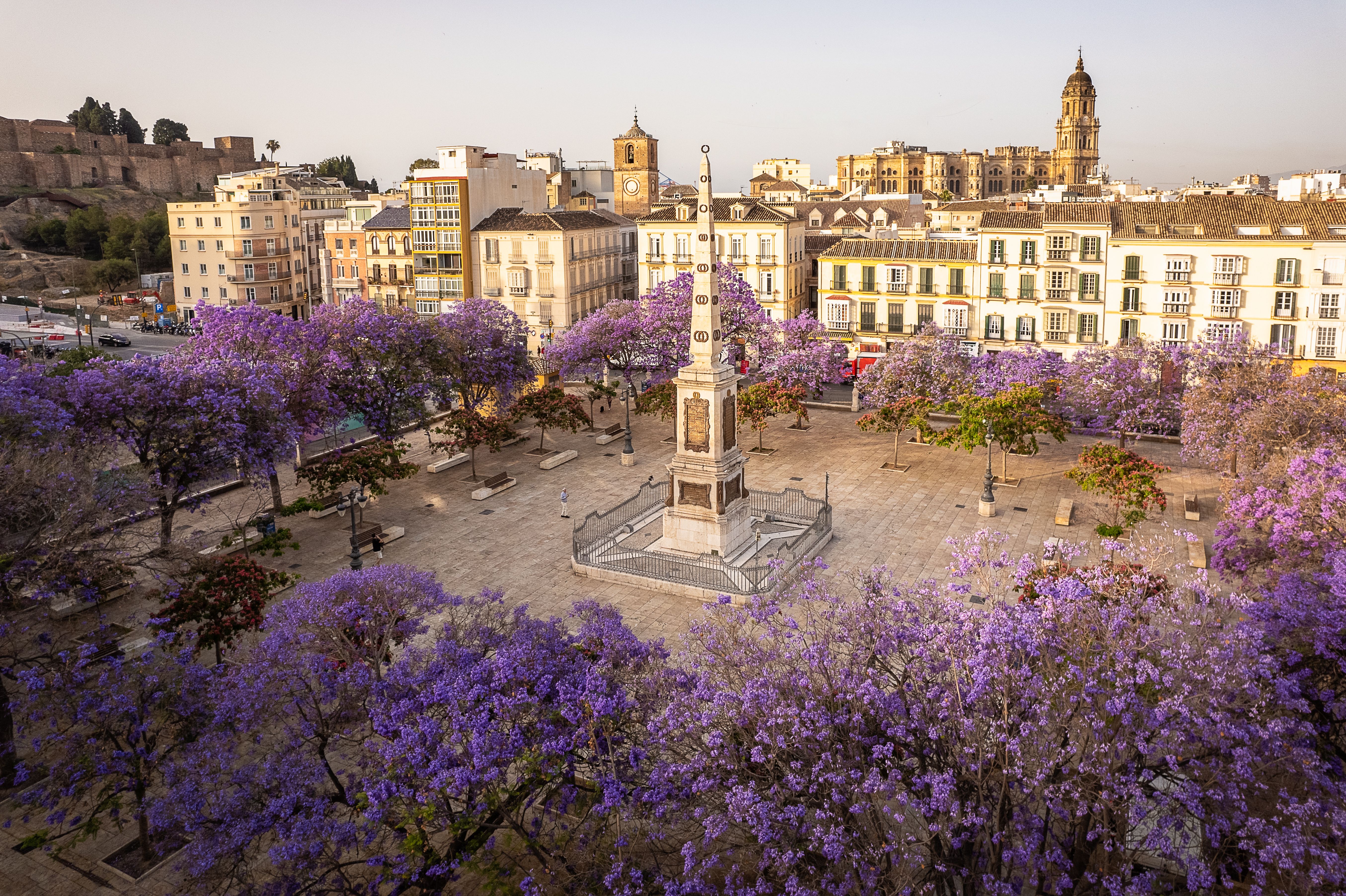 Drone view of the empty Plaza de la Merced in downtown Malaga Spain taken during early morning hours stock photo