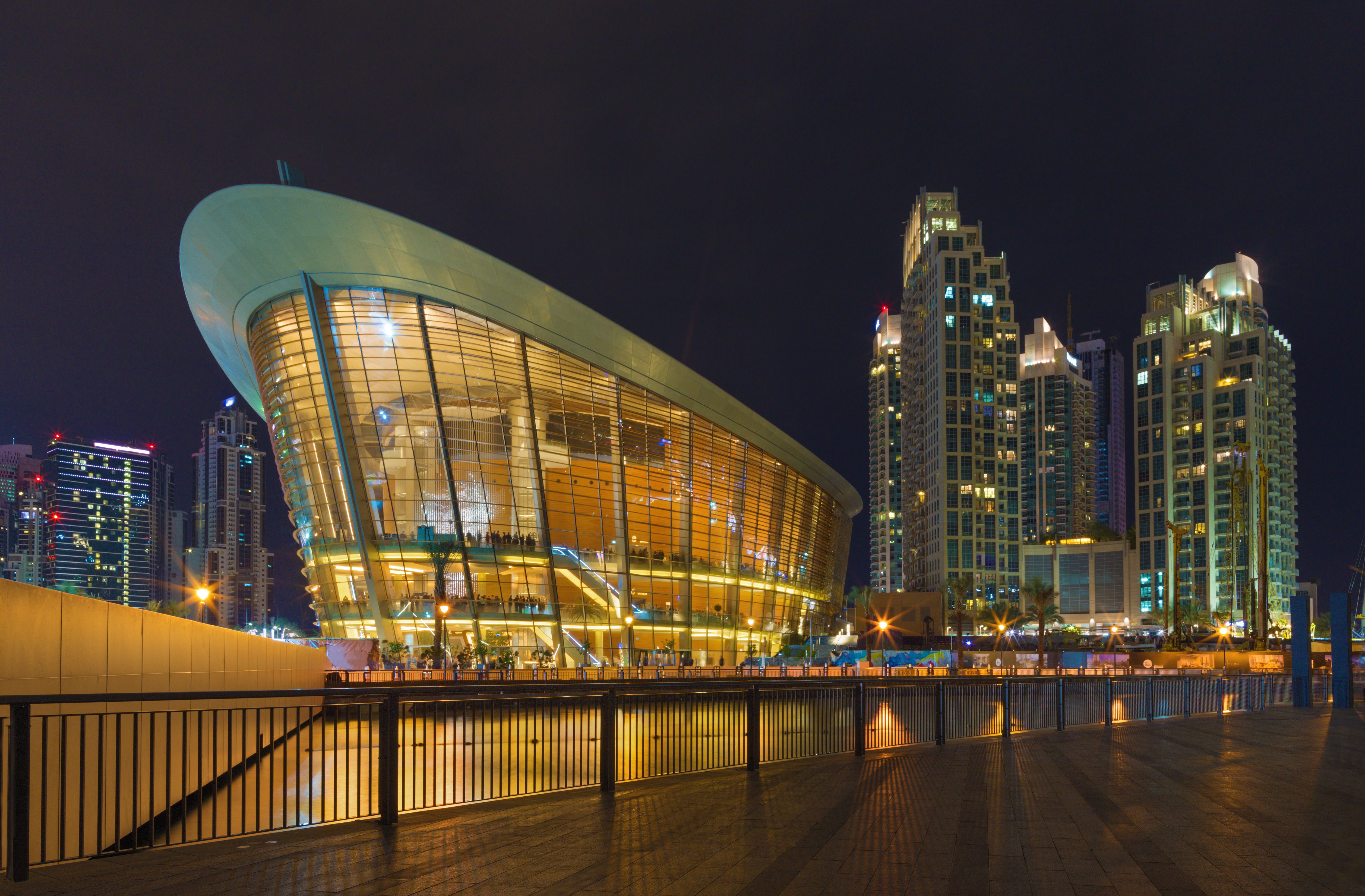 Dubai - The nightly panorama of fountain in front of Burj Khalifa and opera.