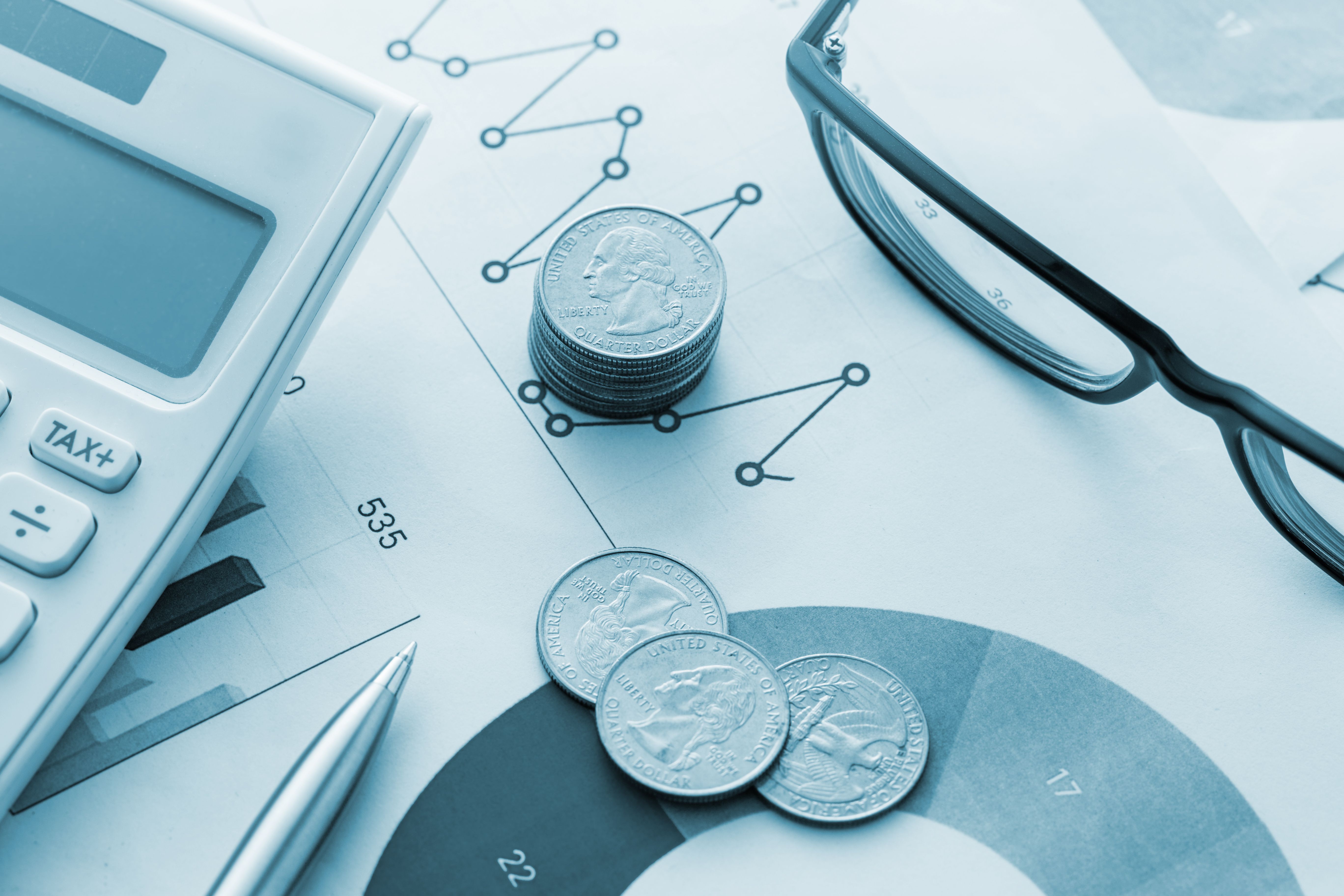 Economich charts and stacked coins