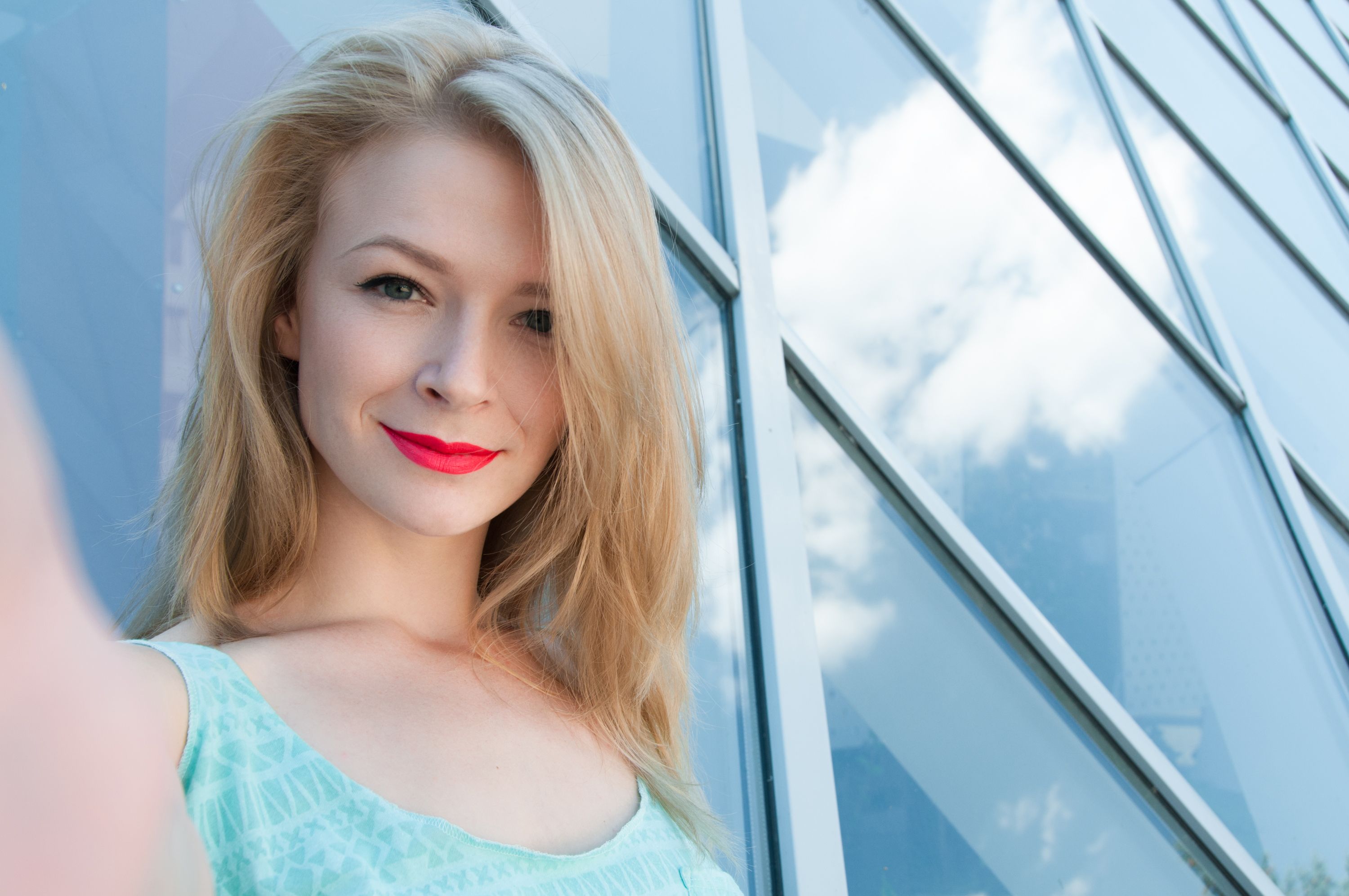 Young happy woman taking selfie Young happy woman taking selfie
