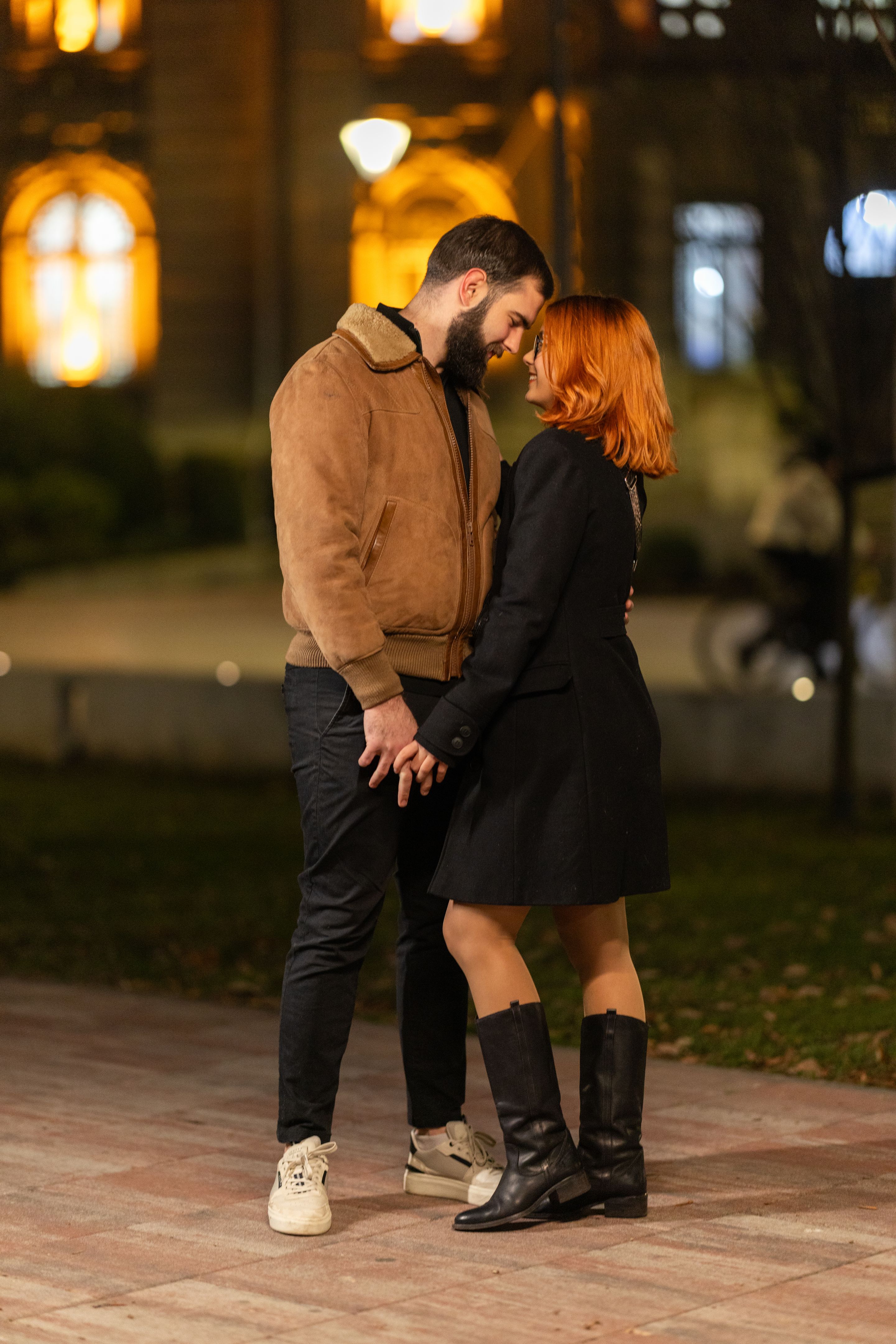 Young couple enjoying winter evening in the city