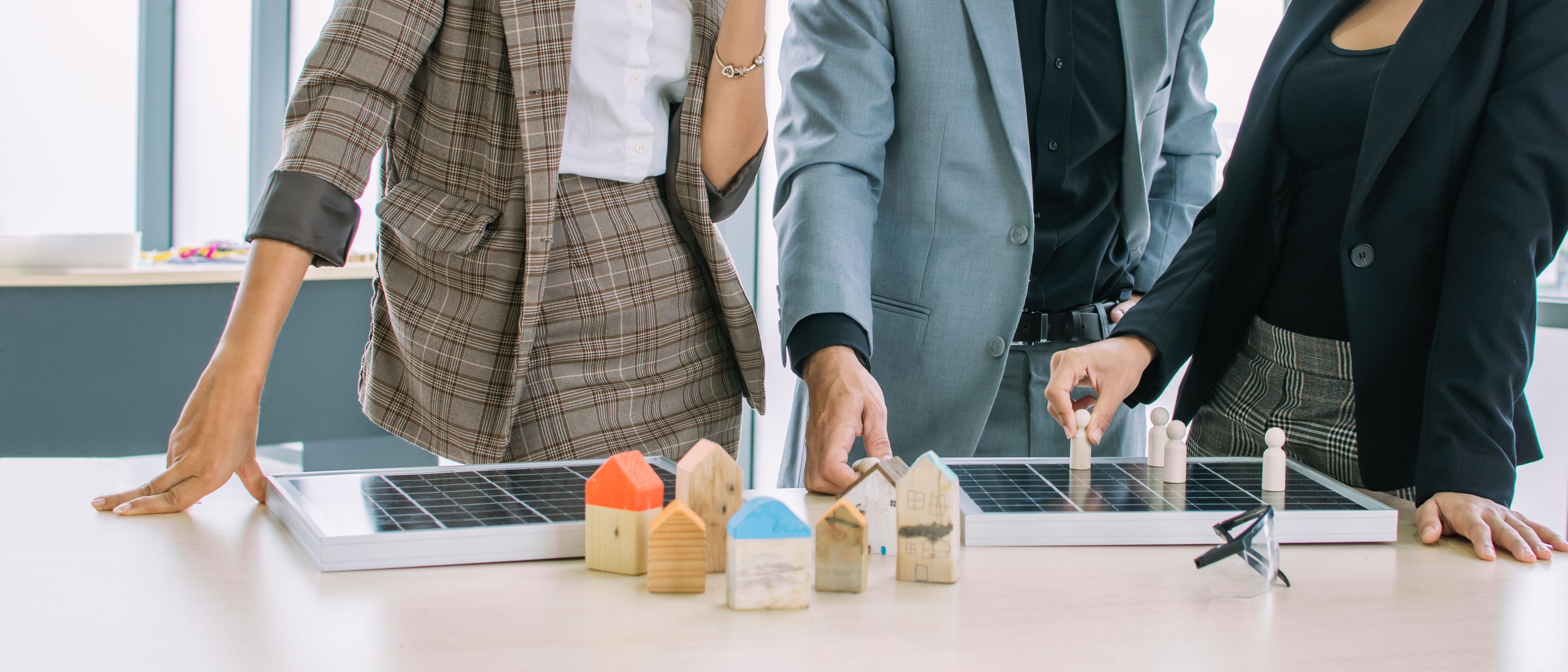 Banner formal businesspeople standing in indoor modern office, selling, presenting solar cell for sustainability, environment and house construction project. Business Concept. Banner formal businesspeople standing in indoor modern office, selling, presenting solar cell for sustainability, environment and house construction project. Business Concept.