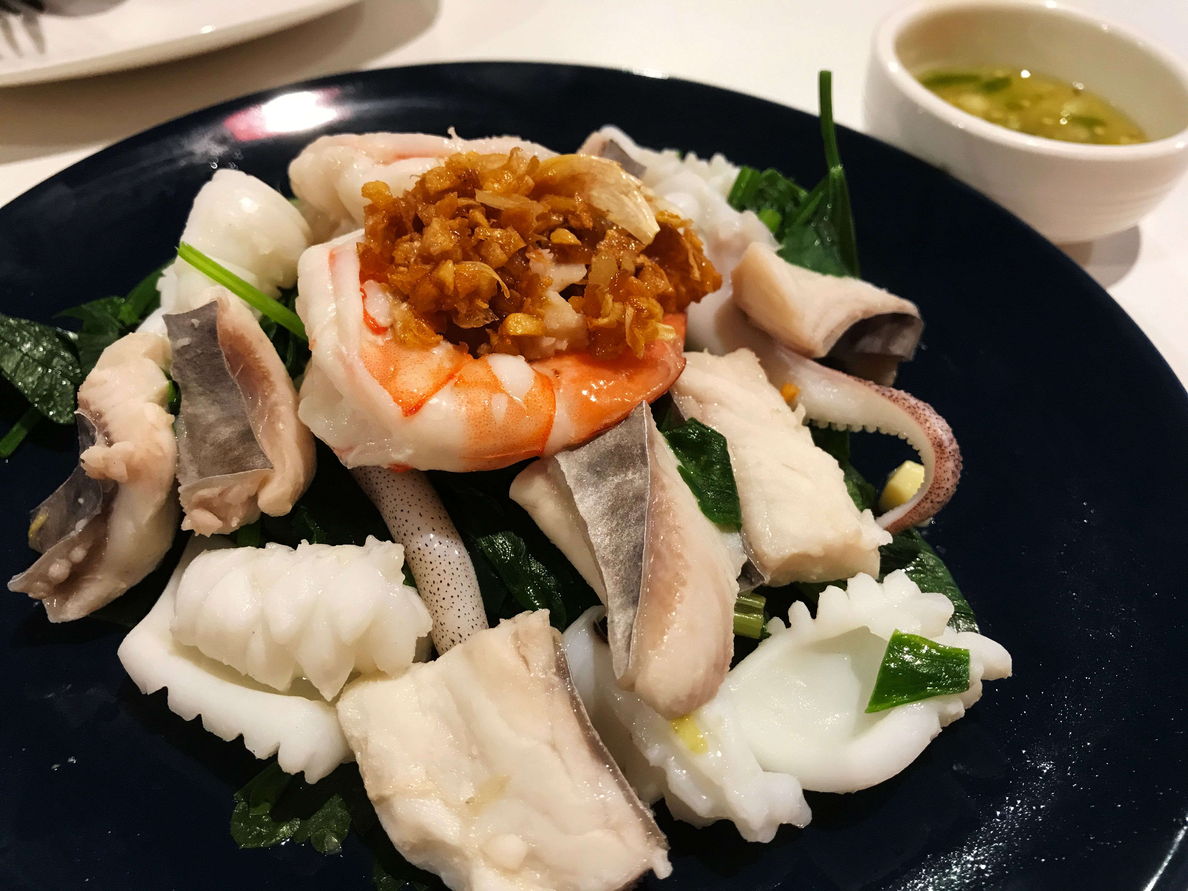 boiled seafood dip with hot and sour sauce, seafood has shrimp, fish and squid.delicious of Thai food , Name of this menu in Thailand : 