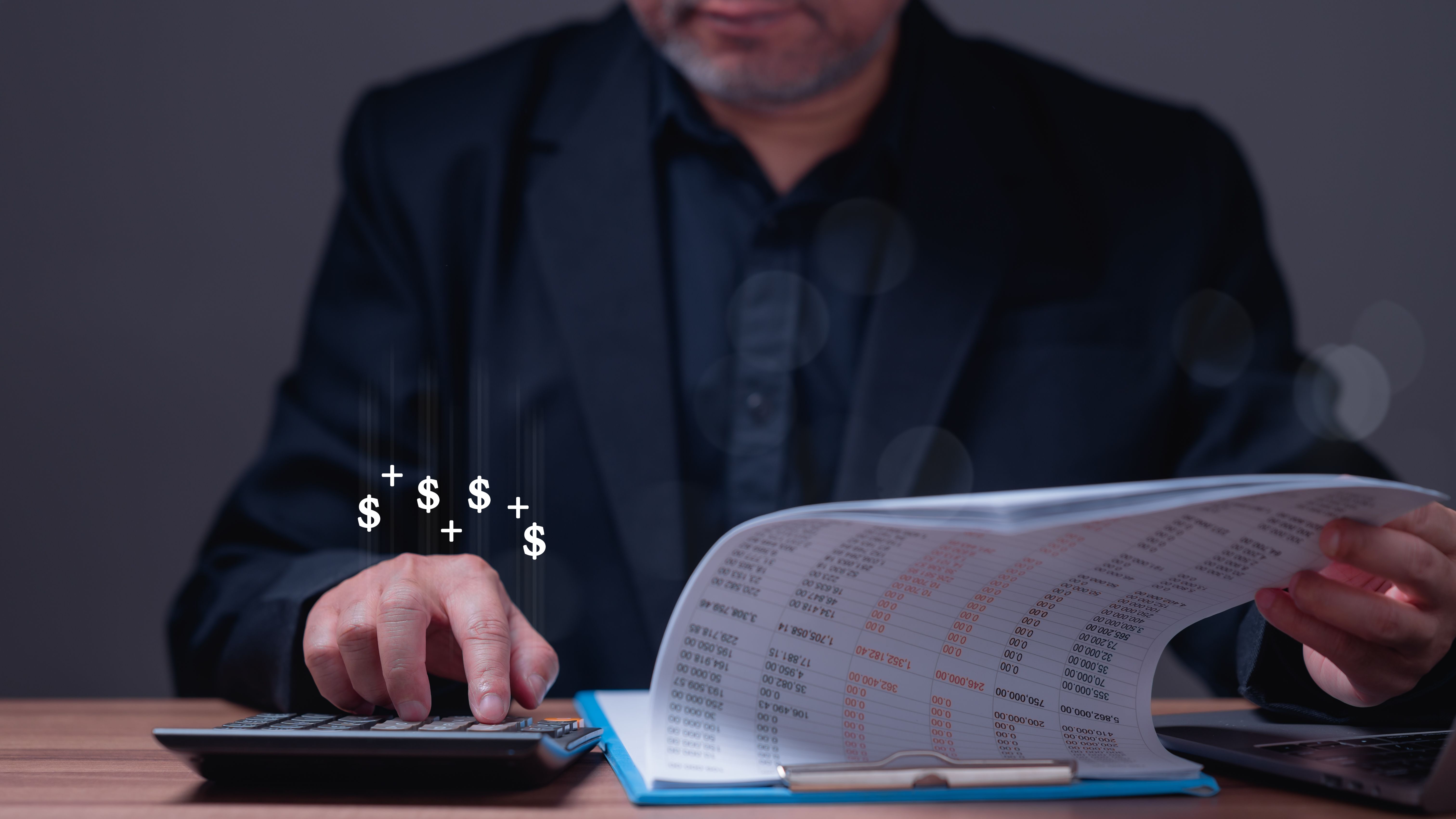 Banking manager is sitting at a desk with a calculator and a stack of papers. He is looking at the papers and seems to be calculating something, loan, money, finance, interest, Stock, funds