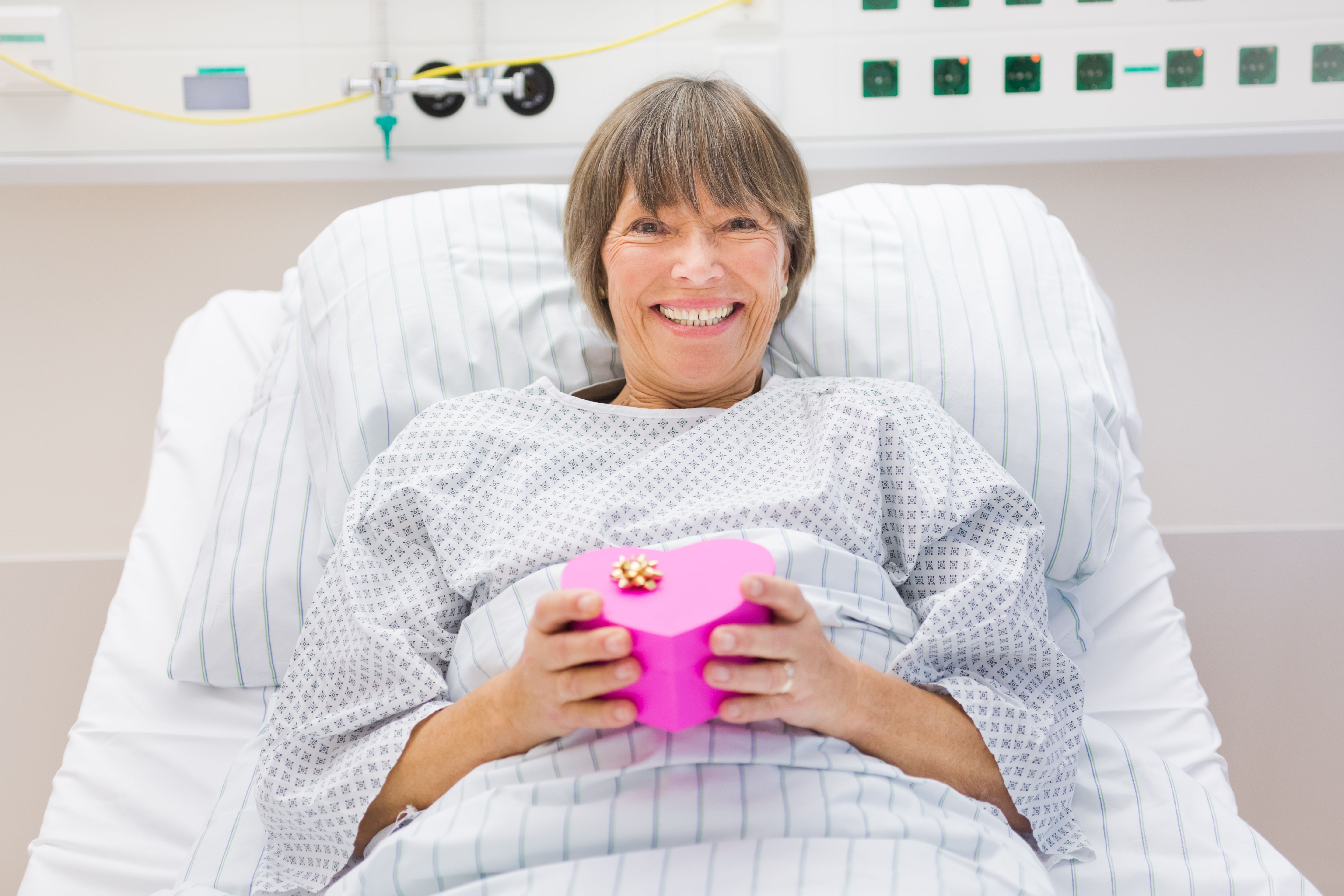 happy patient with gift