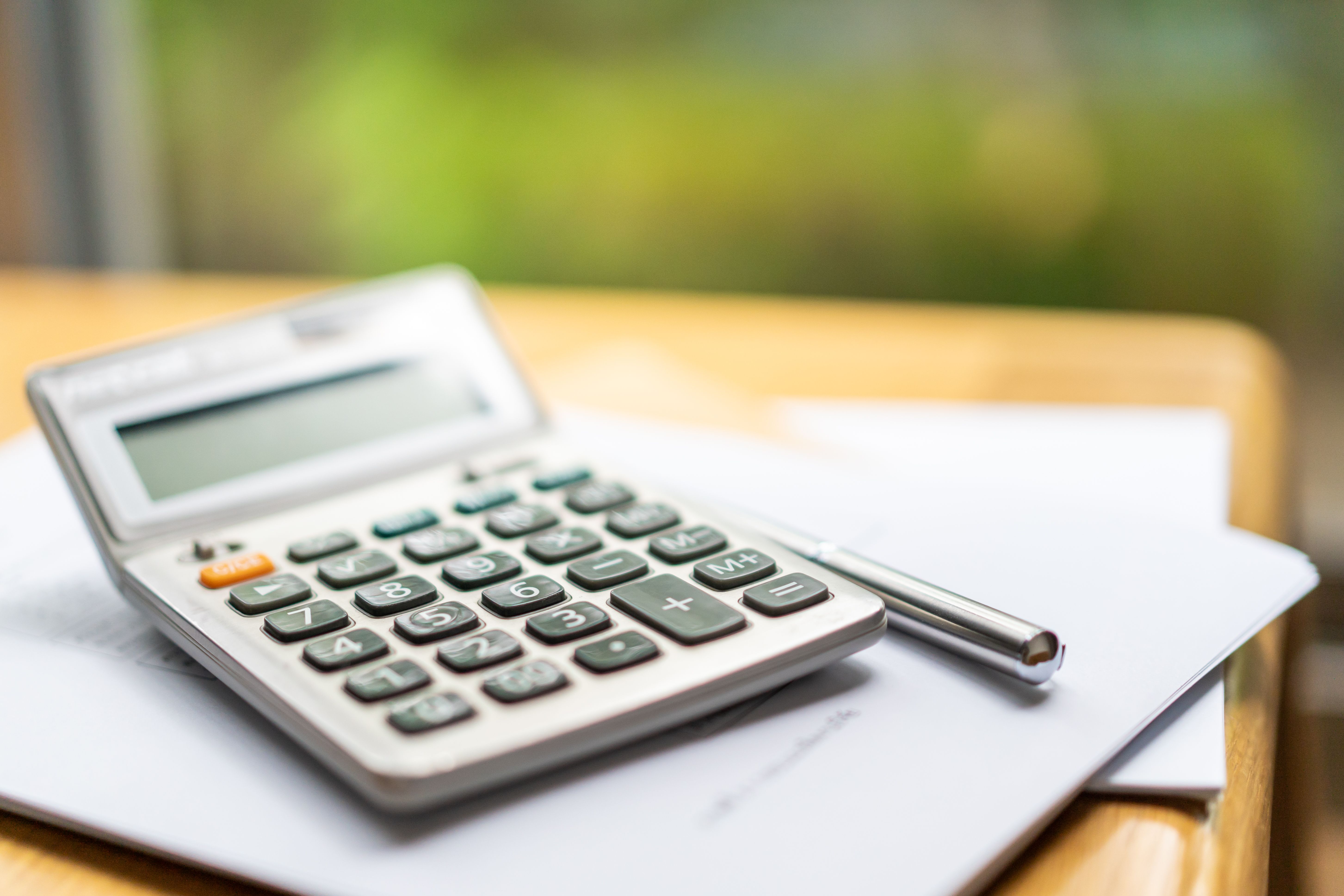 calculator and paperwork