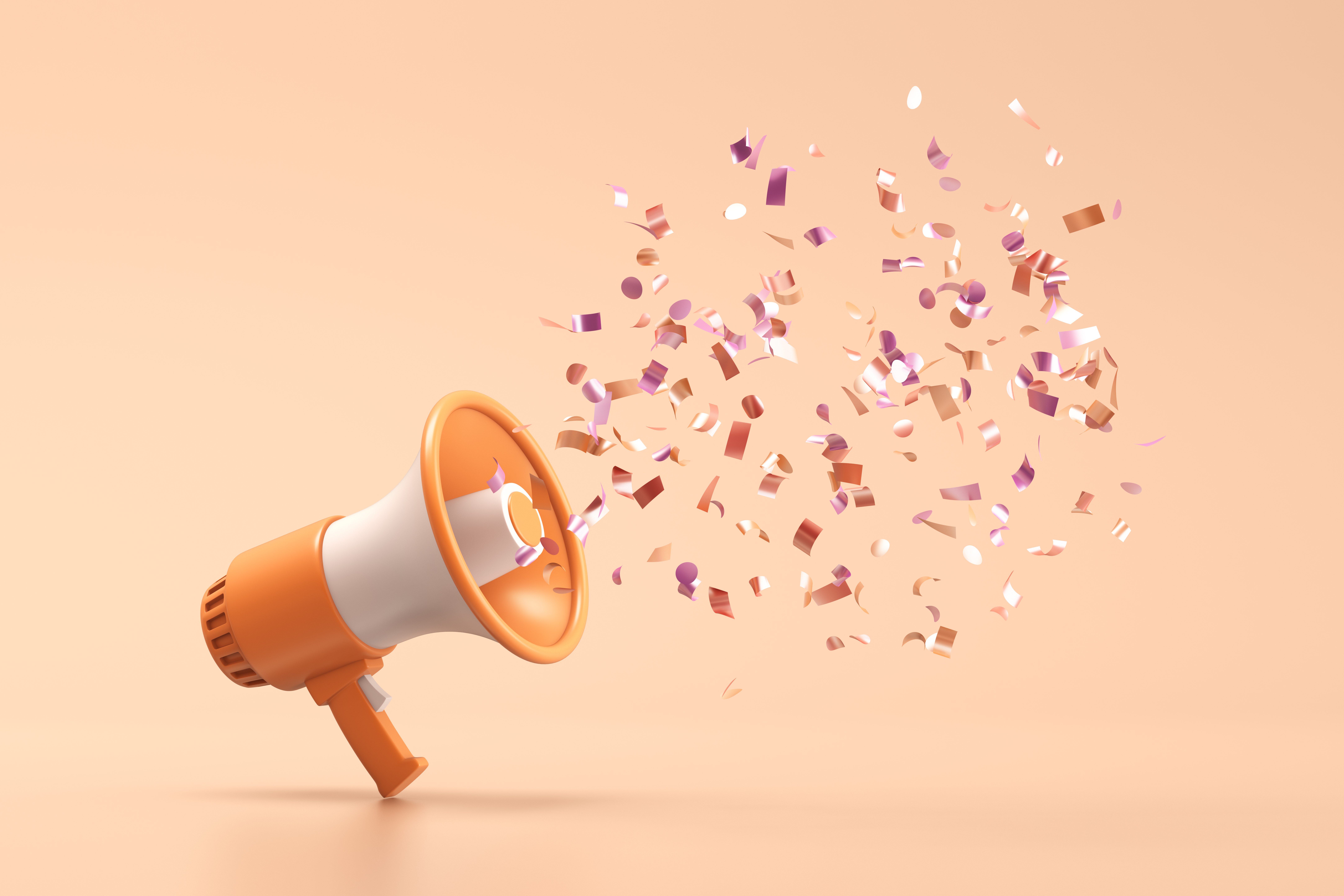 Megaphone with shiny confetti coming out of it