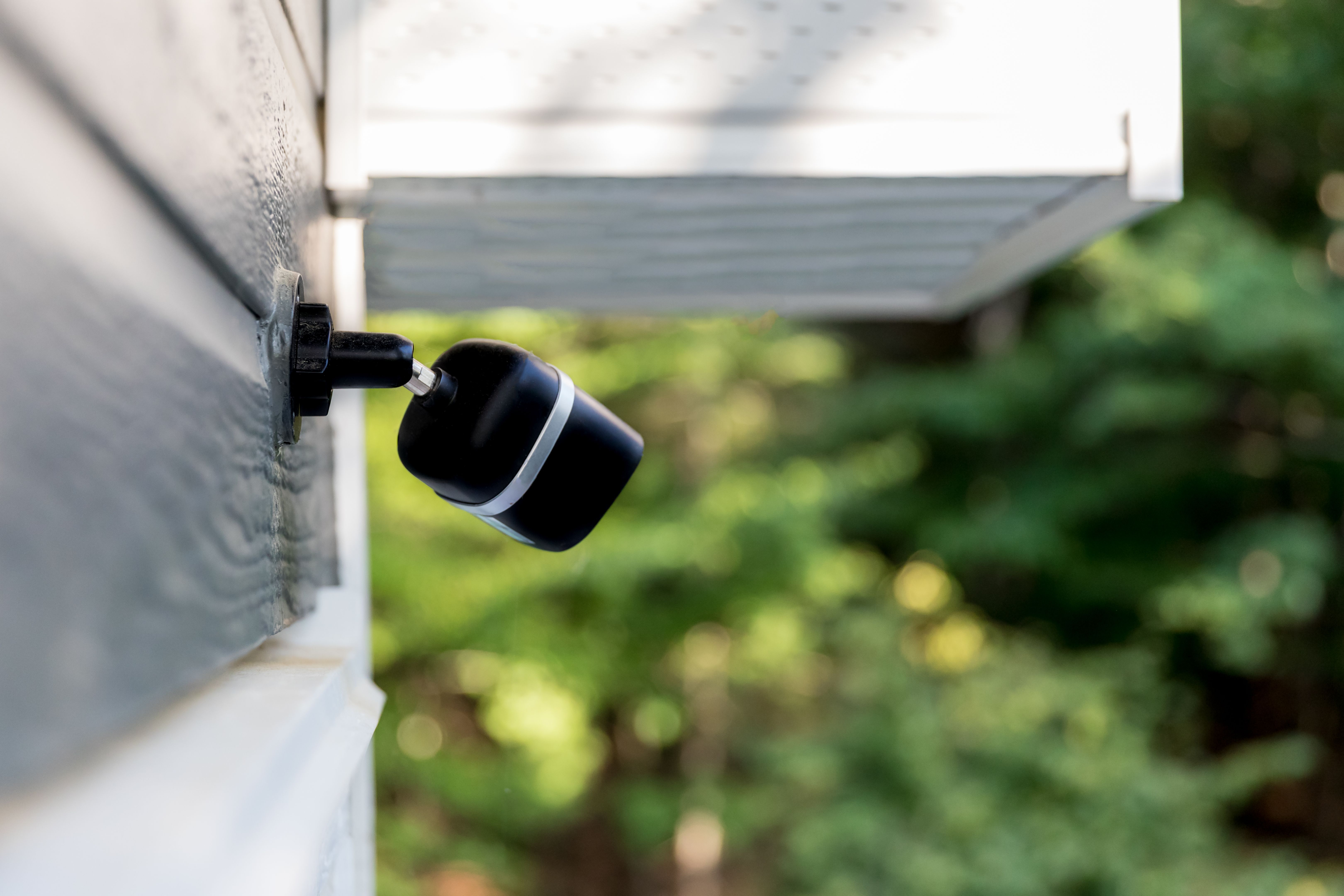 Black cctv outside building, home security system