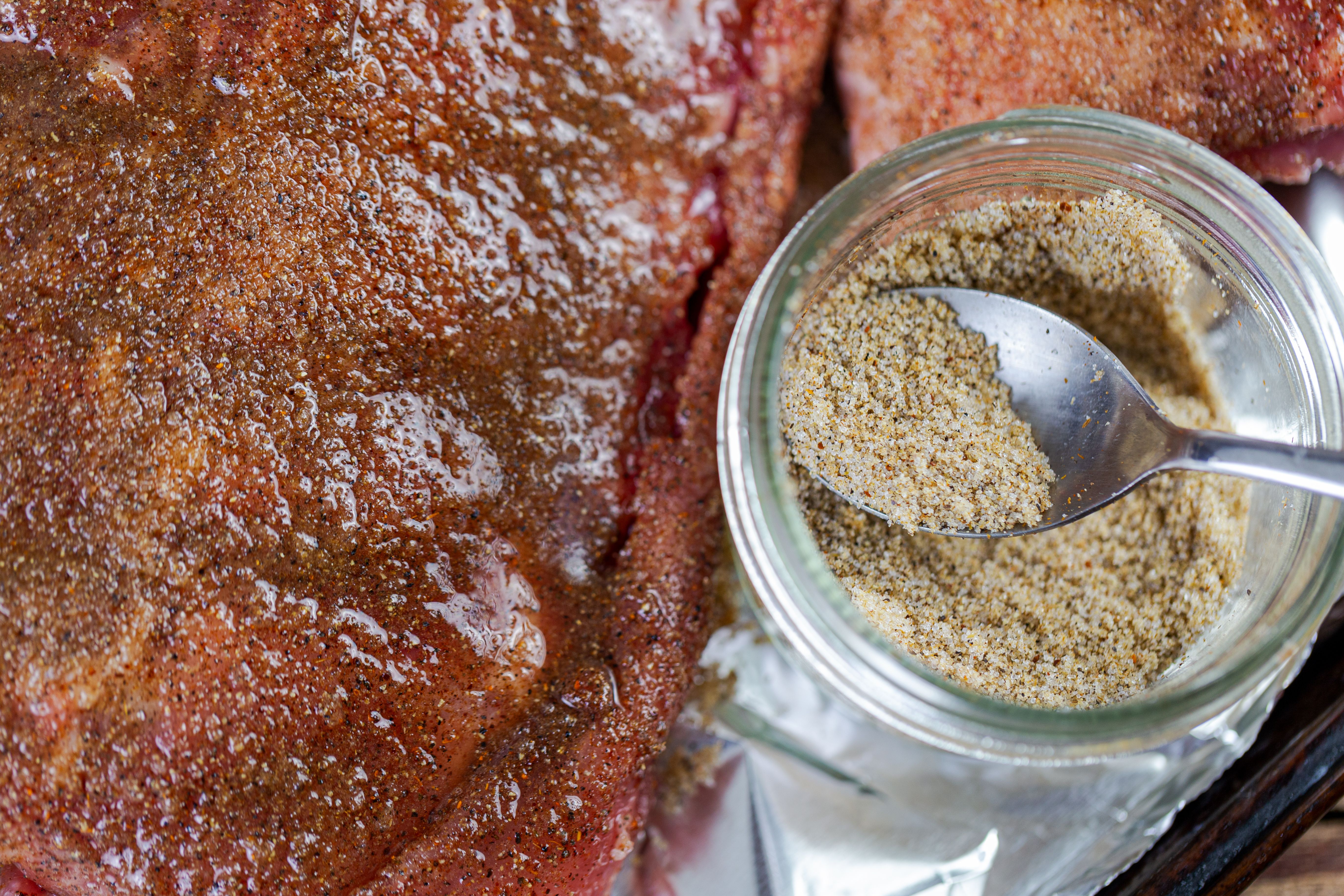 applying barbecue rub