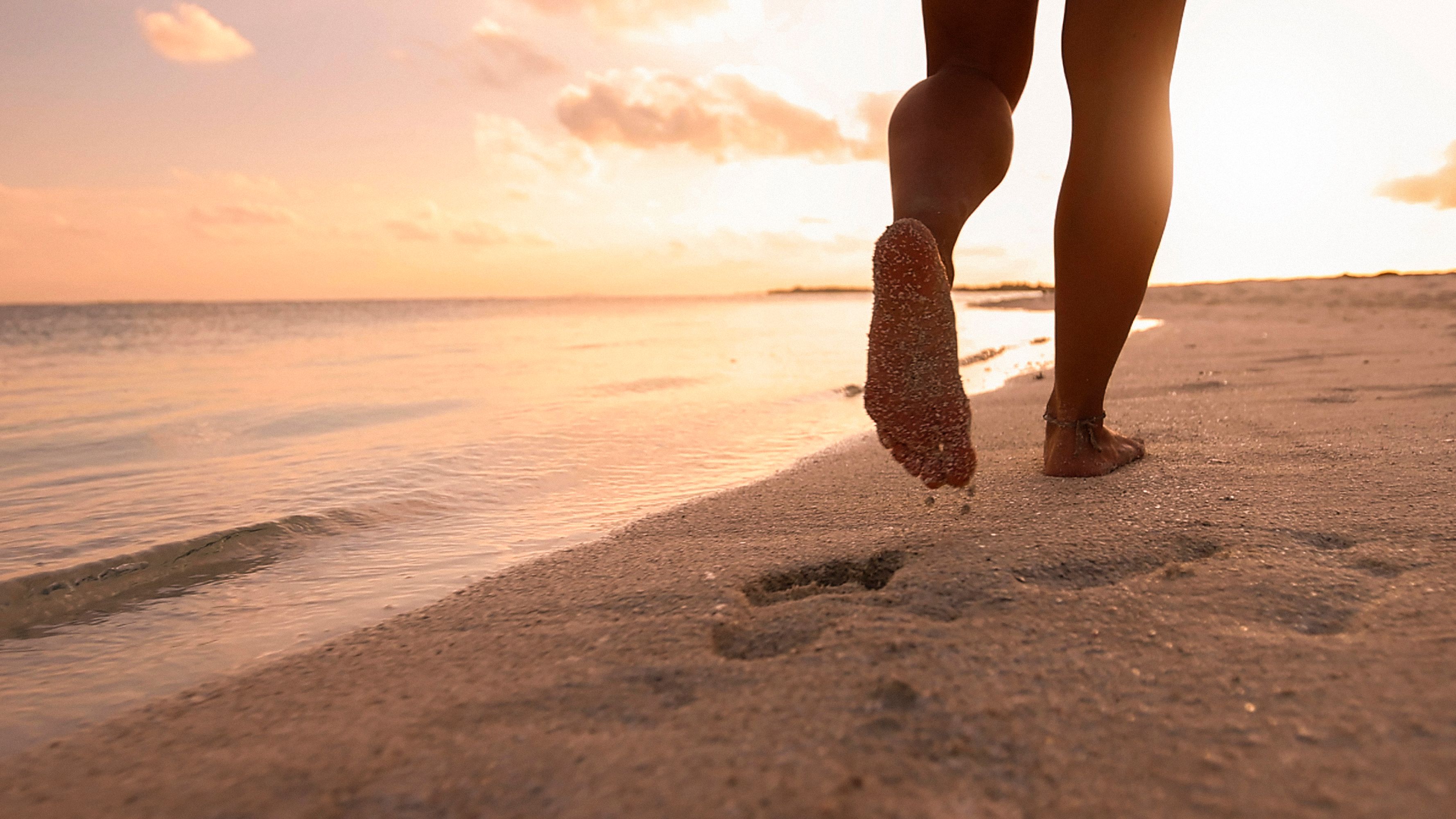 Grounding therapy at the beach