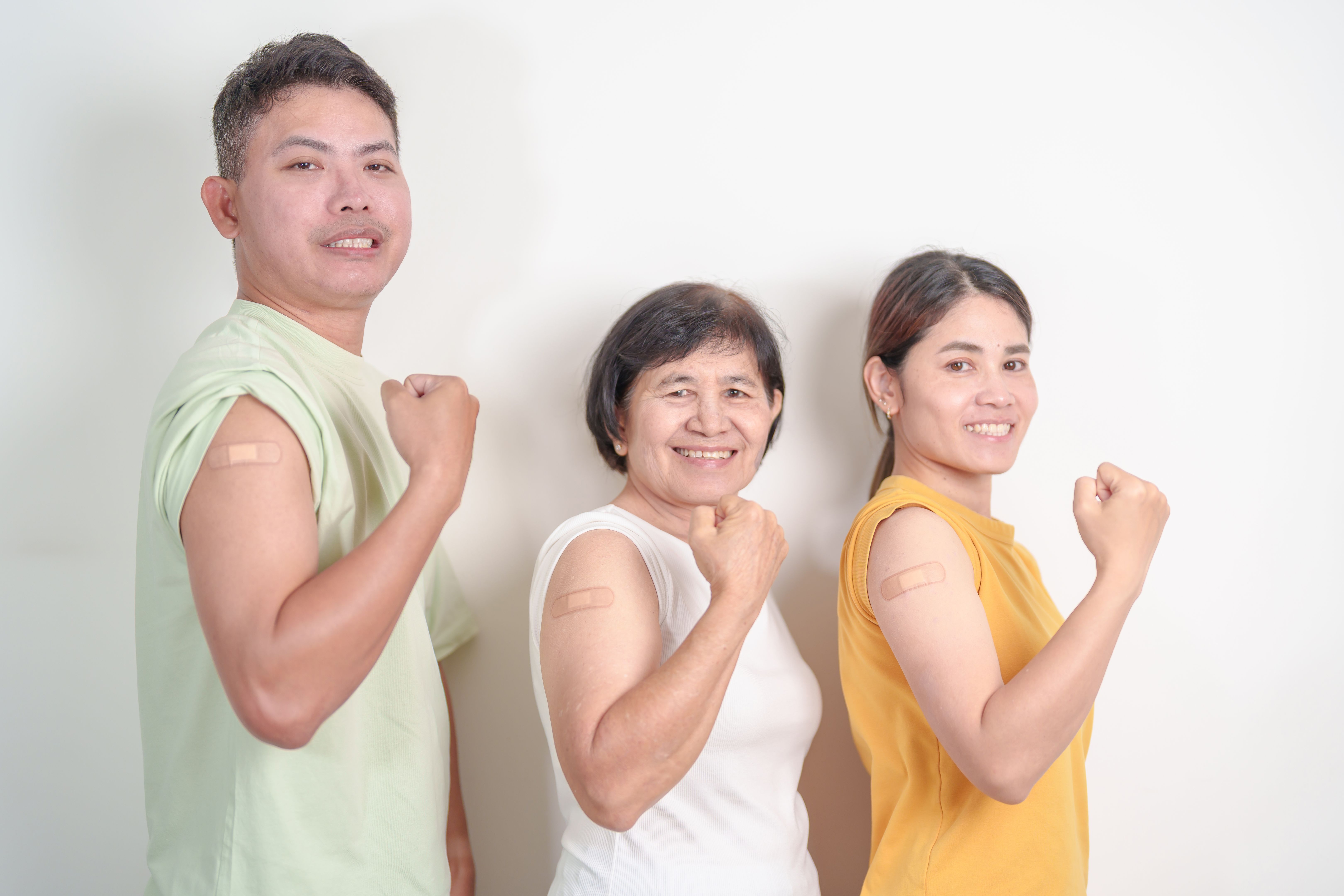 Adult and Senior group with bandage after received vaccine. Vaccination and Immunization for Influenza, HPV, Zoster, IPD, DTP, Dengue, Encephalitis, Rabies, Pneumococcal Hepatitis B and Covid vaccines