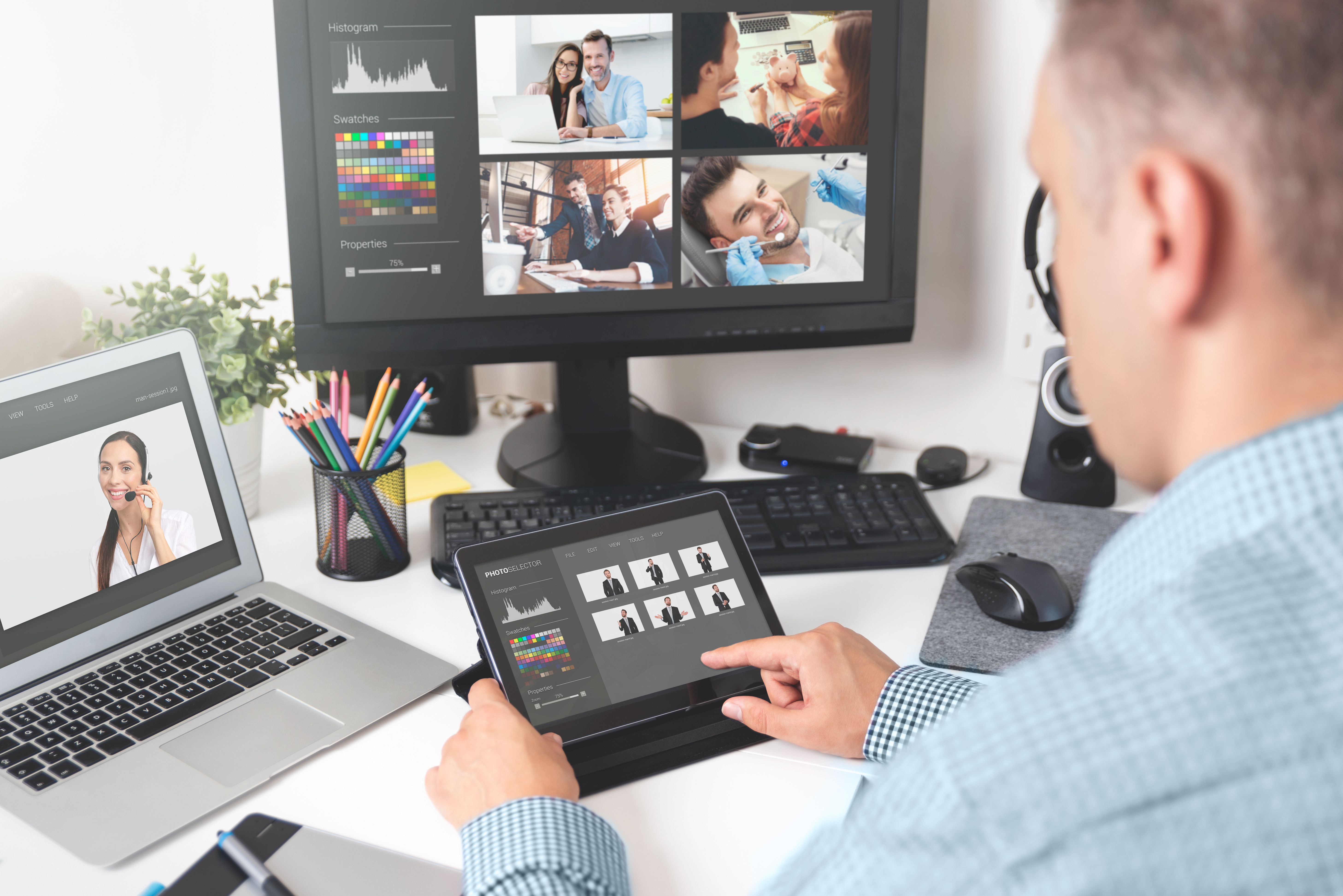 Professional photographer working with photos