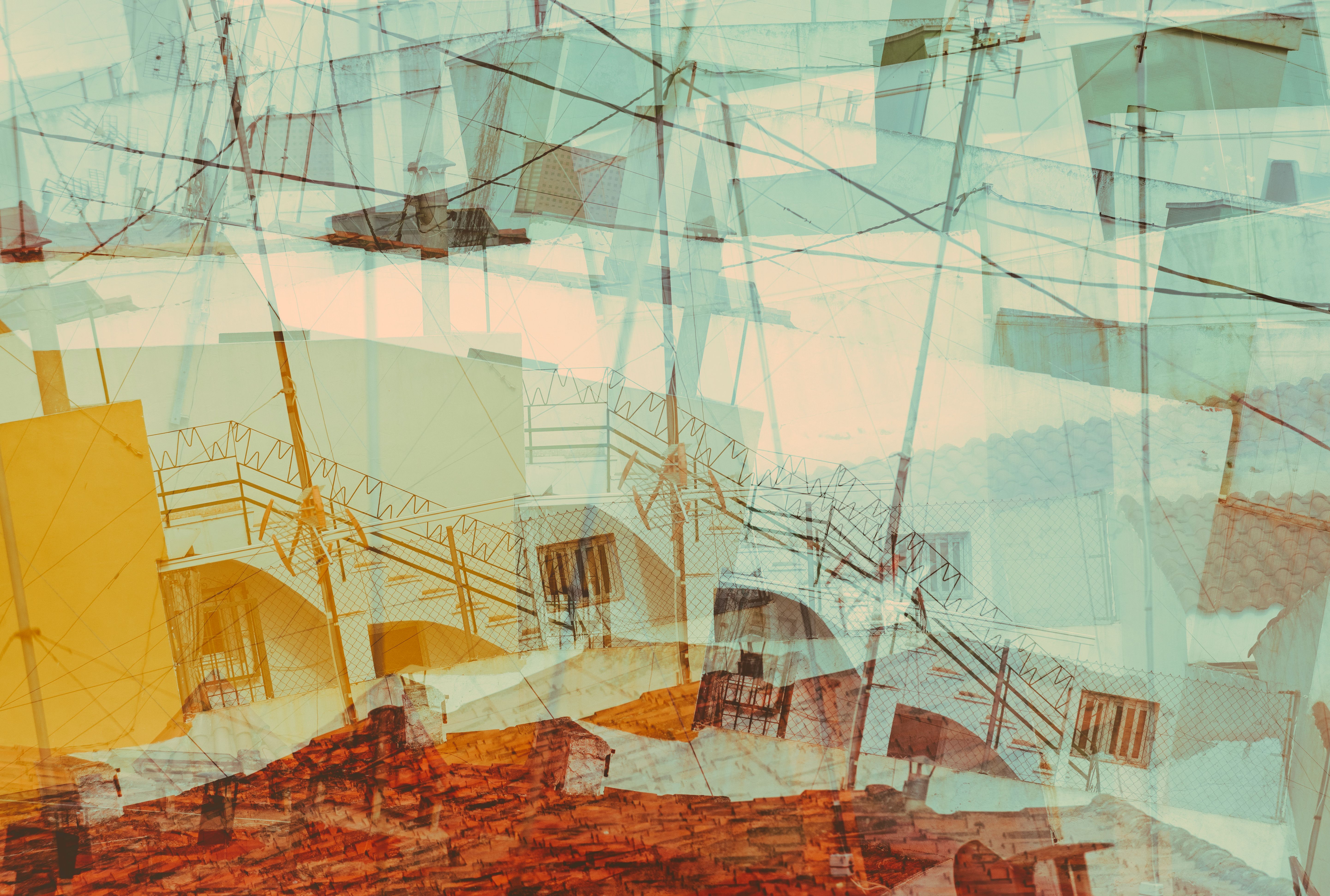 house facades in double exposure in green tinted color from Spain