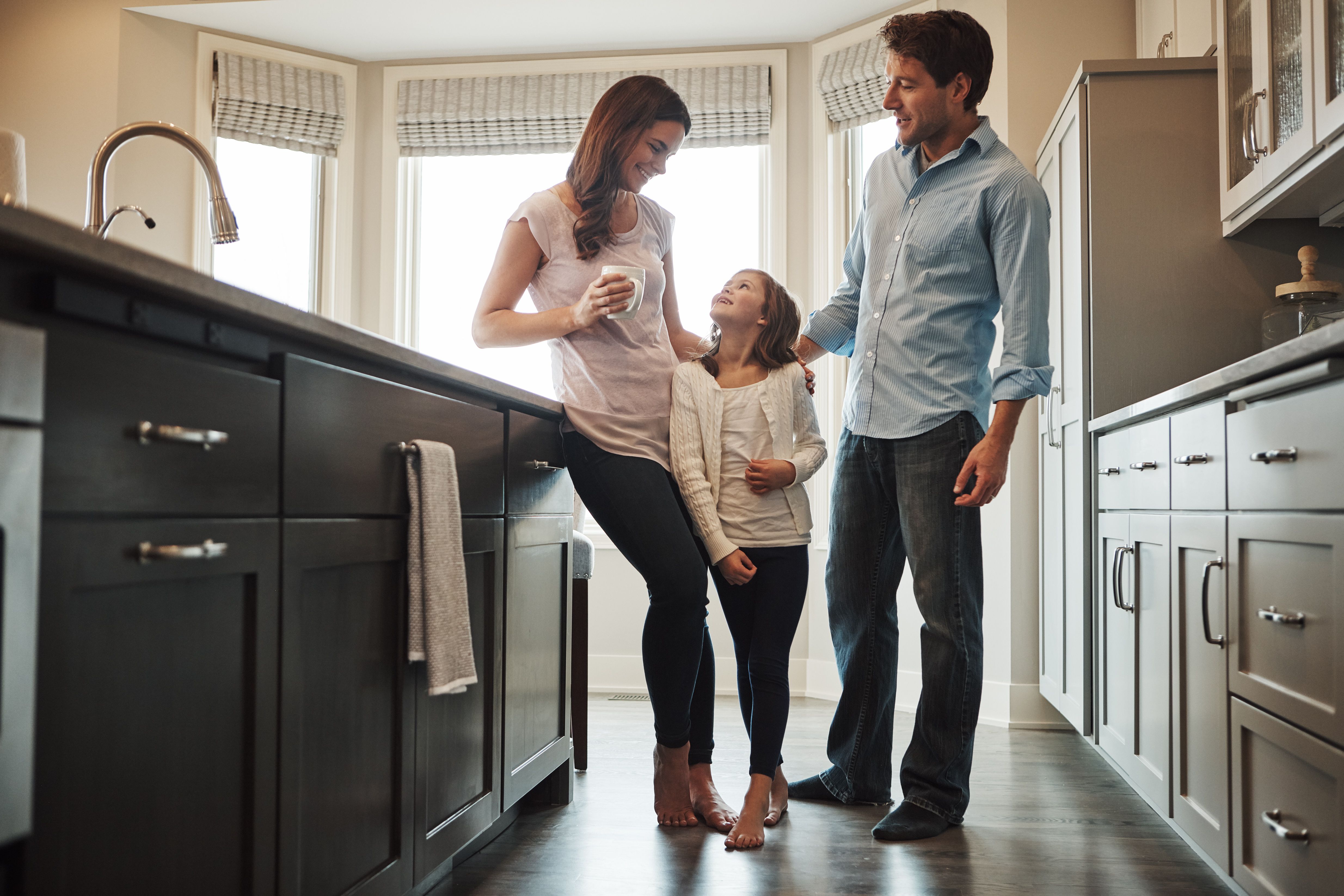 family in renovated kitchen