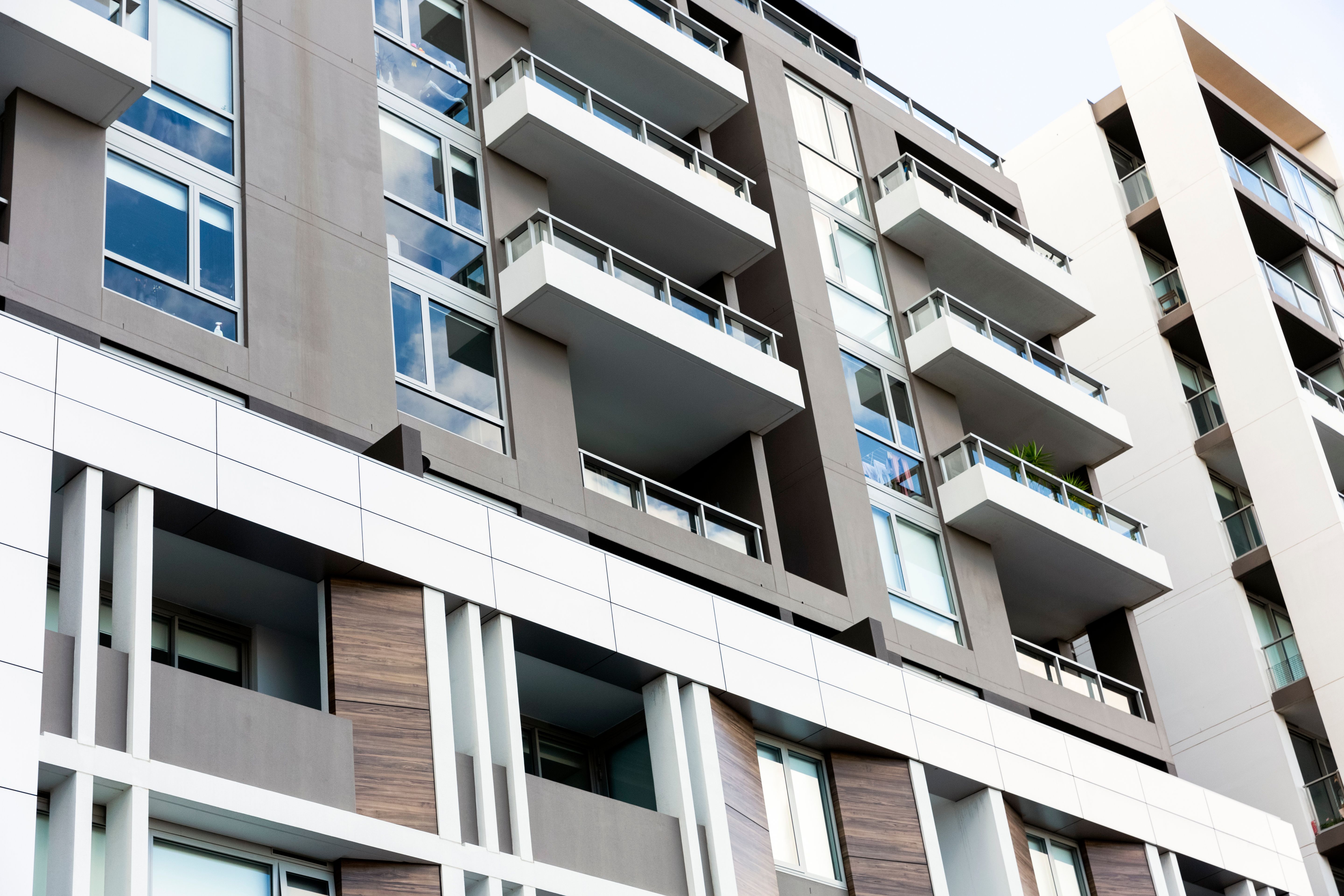 Low angle view of modern residential building, background with copy space