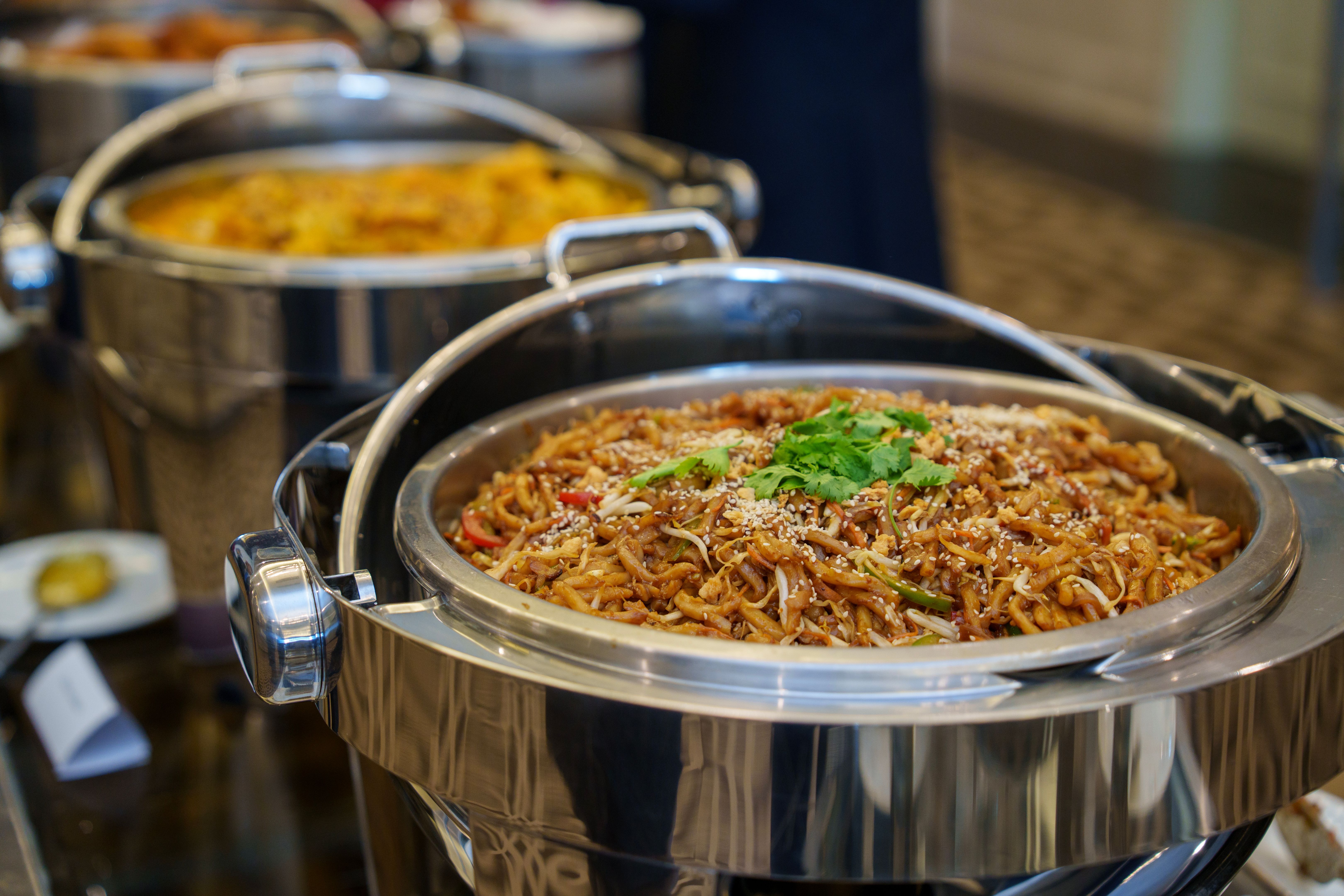 Stir-fried noodles served at buffet counter