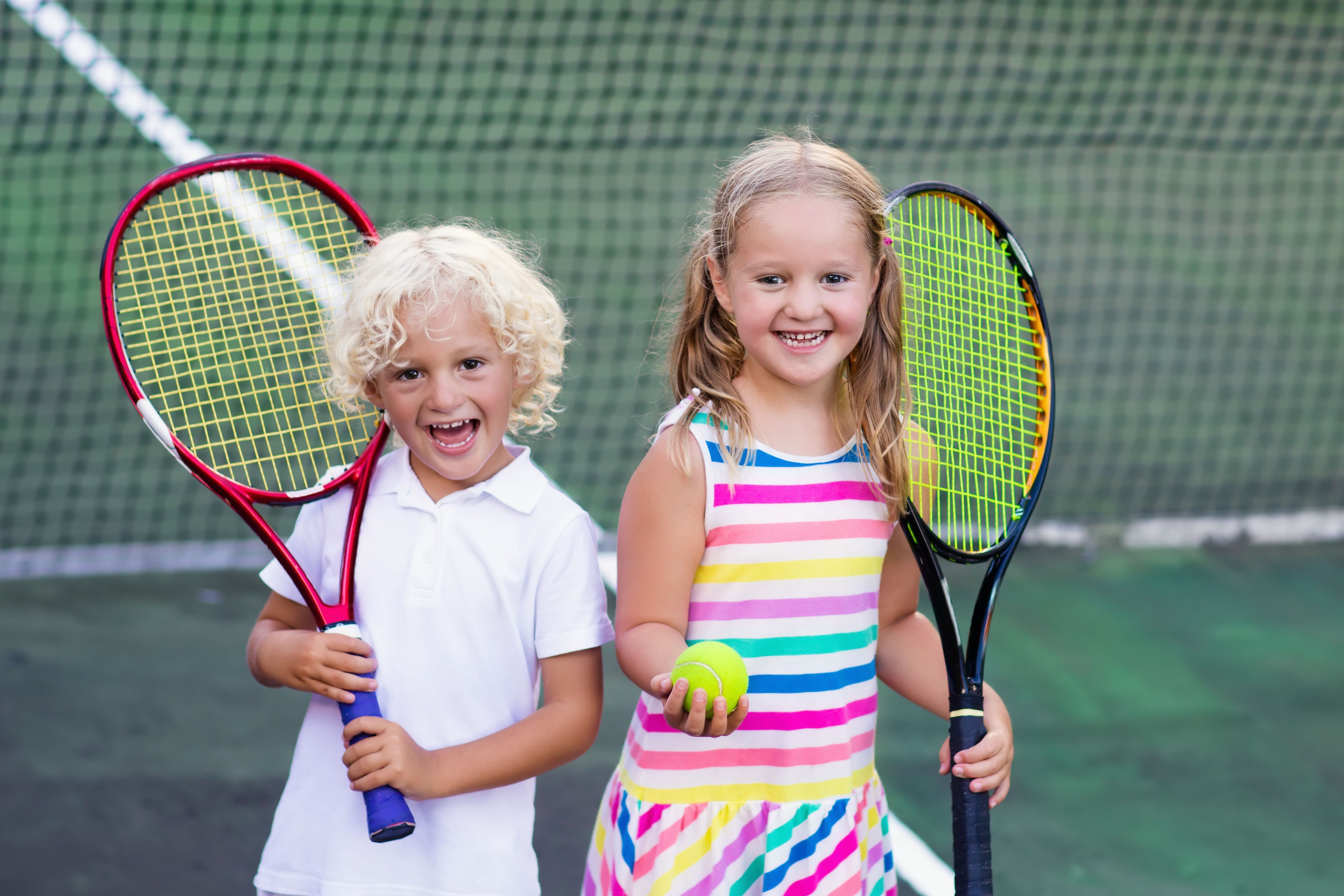 children playing tennis