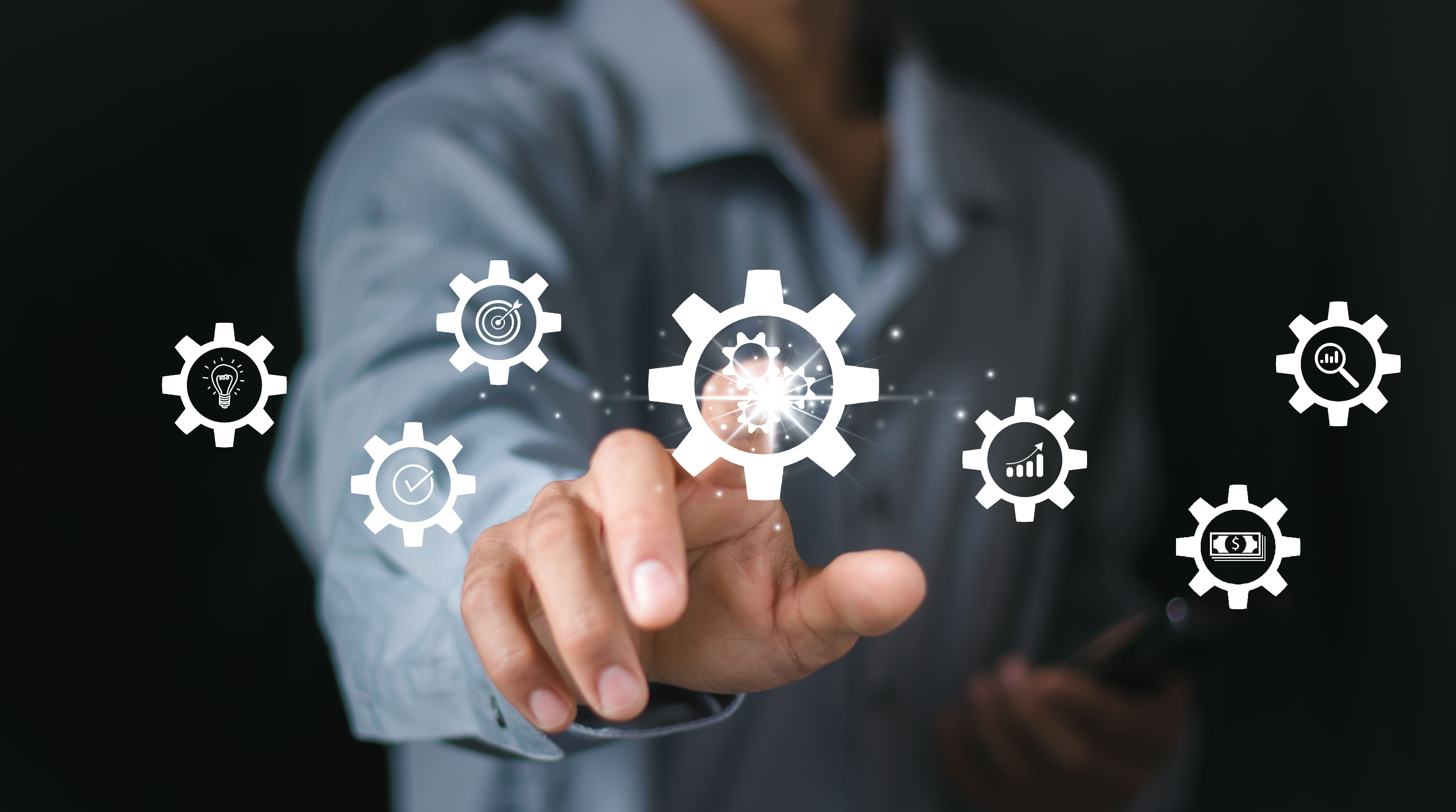 A businessman is working on a virtual innovation screen, business process and problem-solving, which is used for operations management, workflow, and high-quality control.