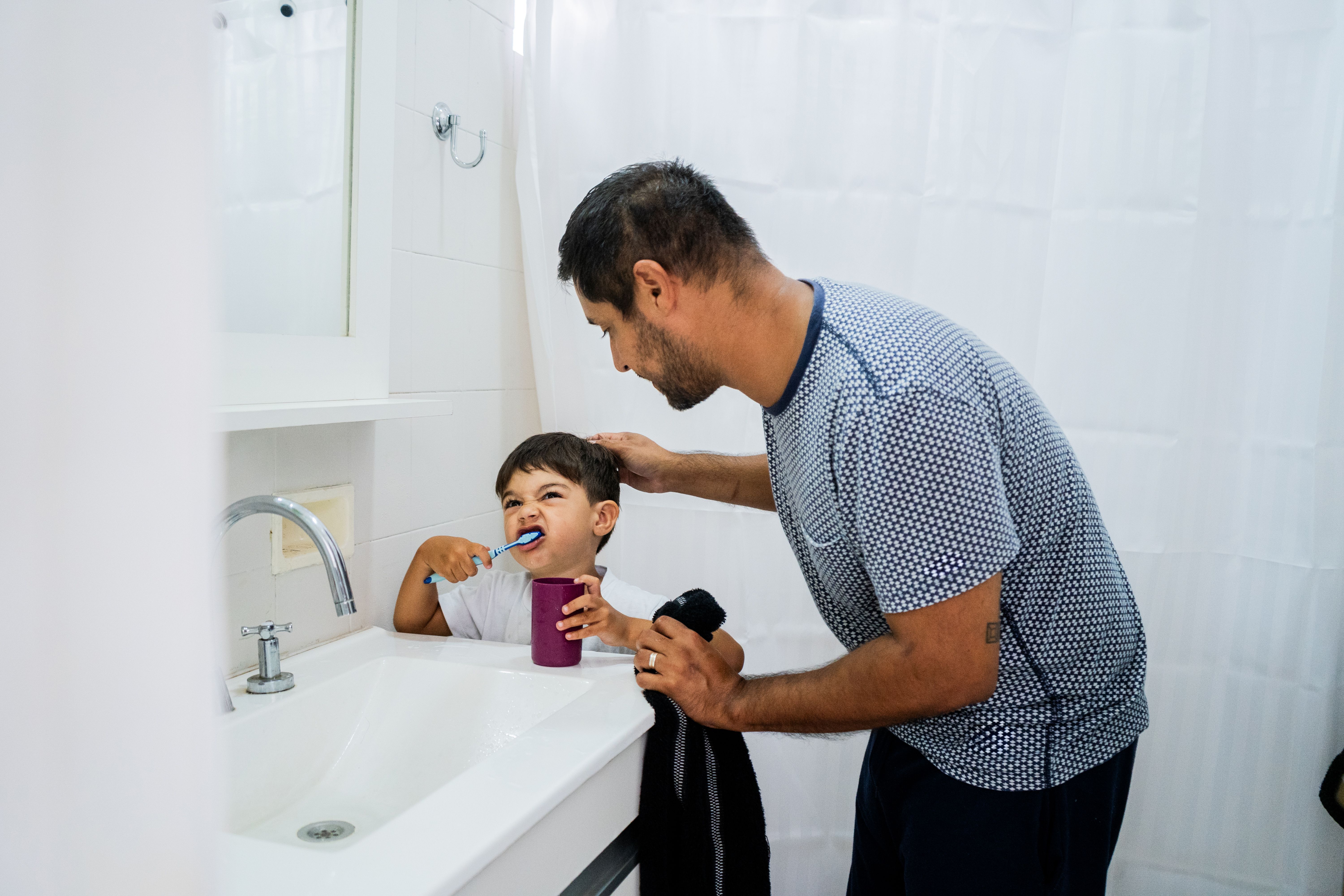 child brushing teeth