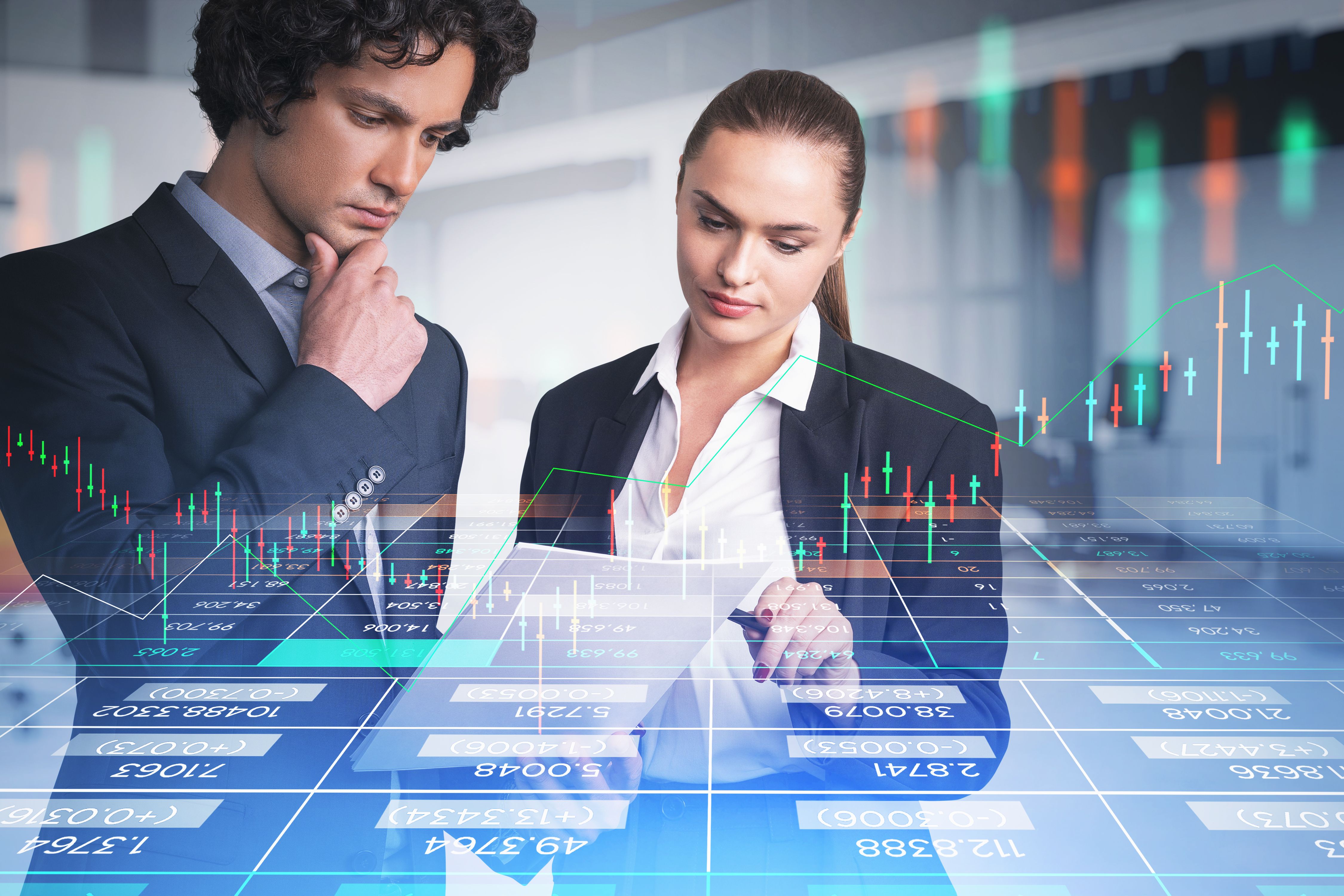 Businessman and businesswoman wearing formal suit are working together