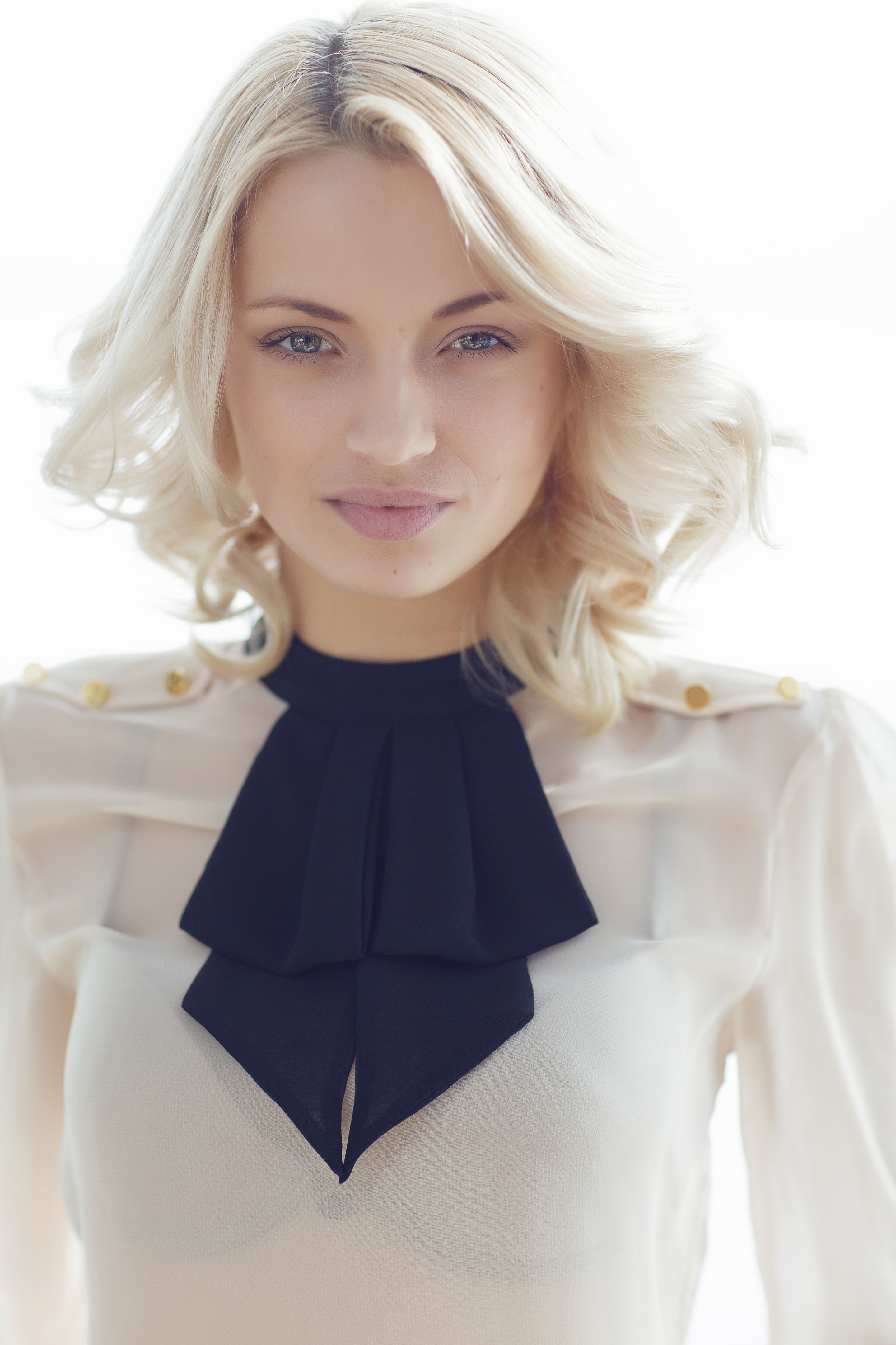 Beautiful blonde woman with sultry expression