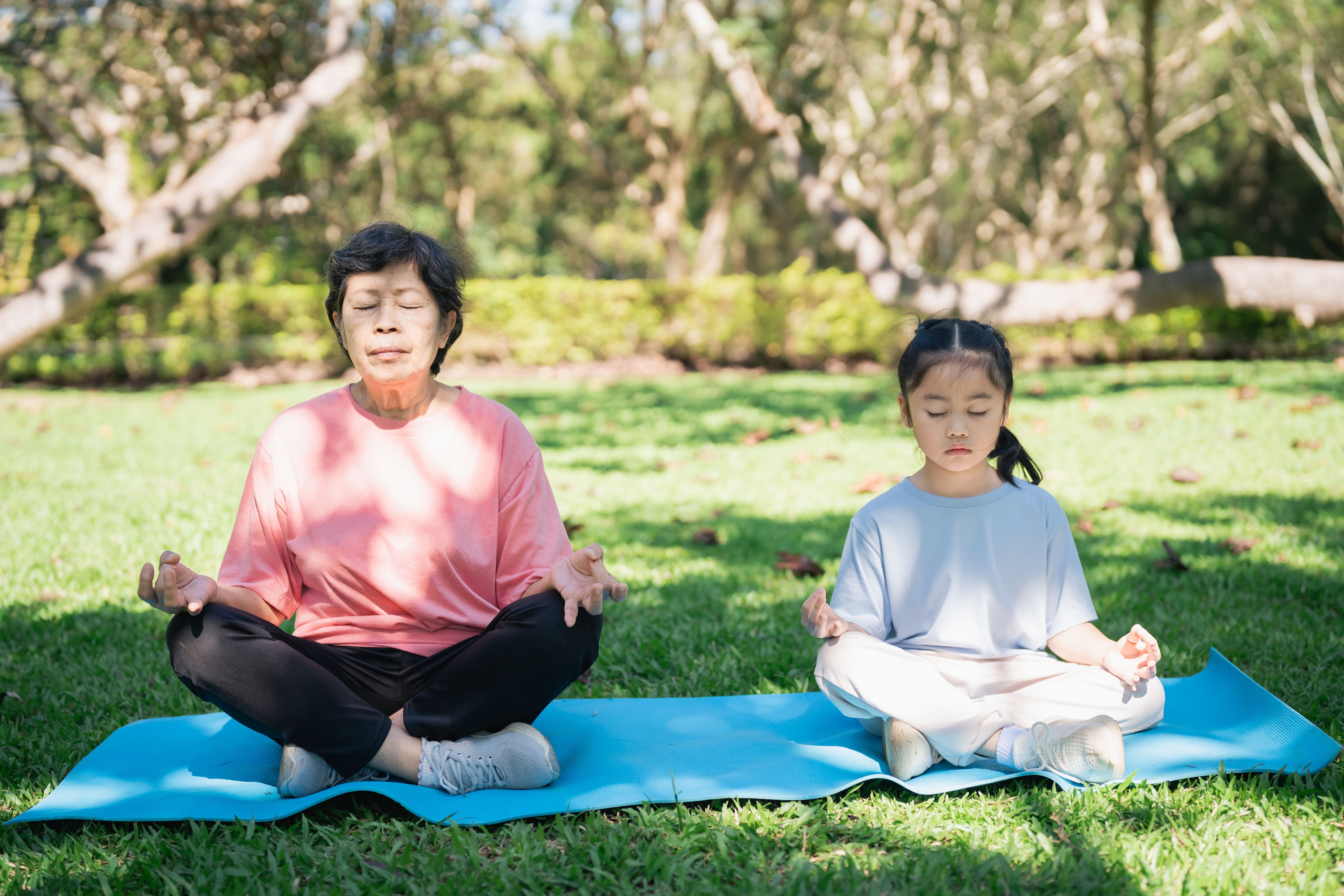 kids doing yoga outdoors
