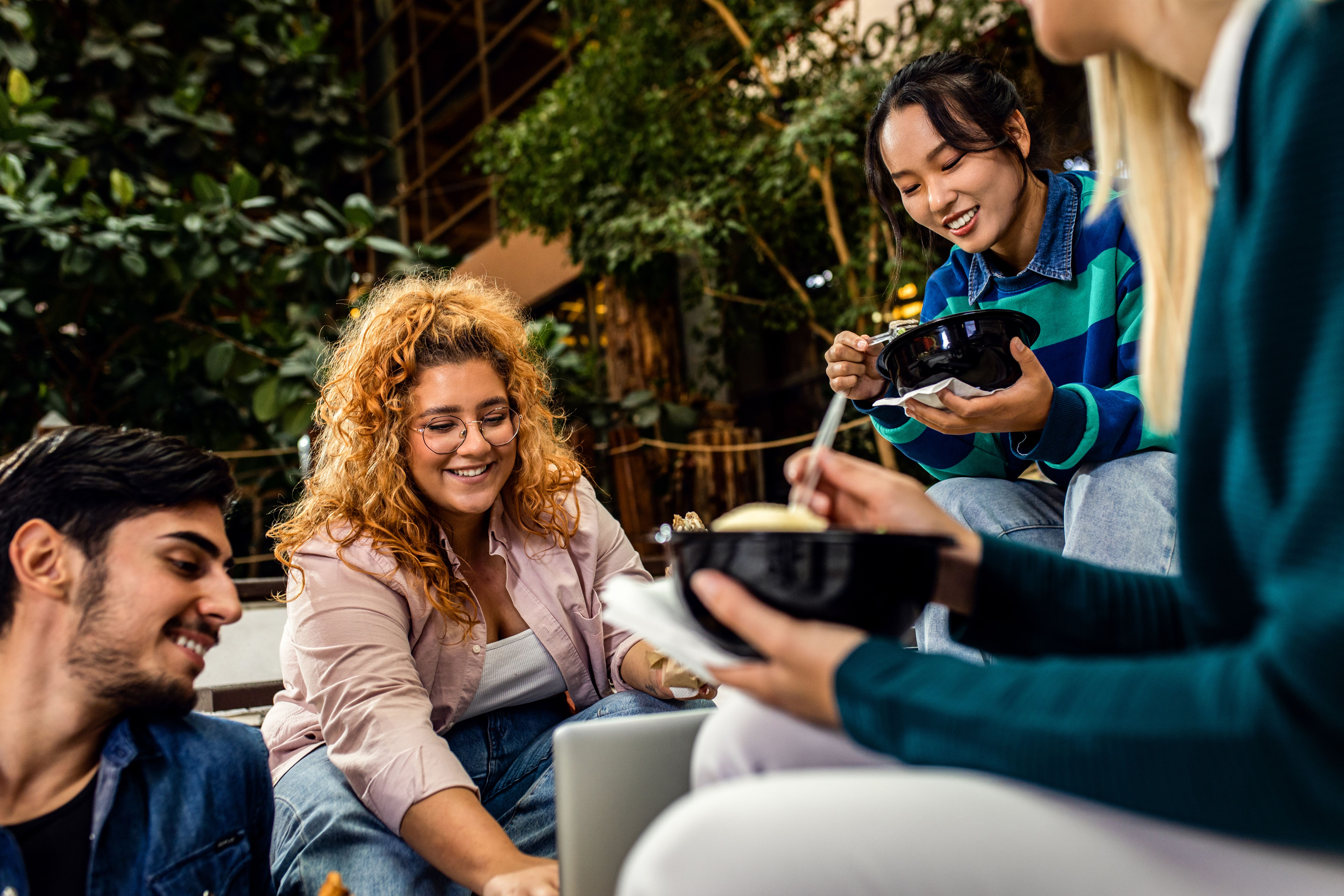 Group of student siting in campus having lunch brake. Group of student siting in campus having lunch brake.