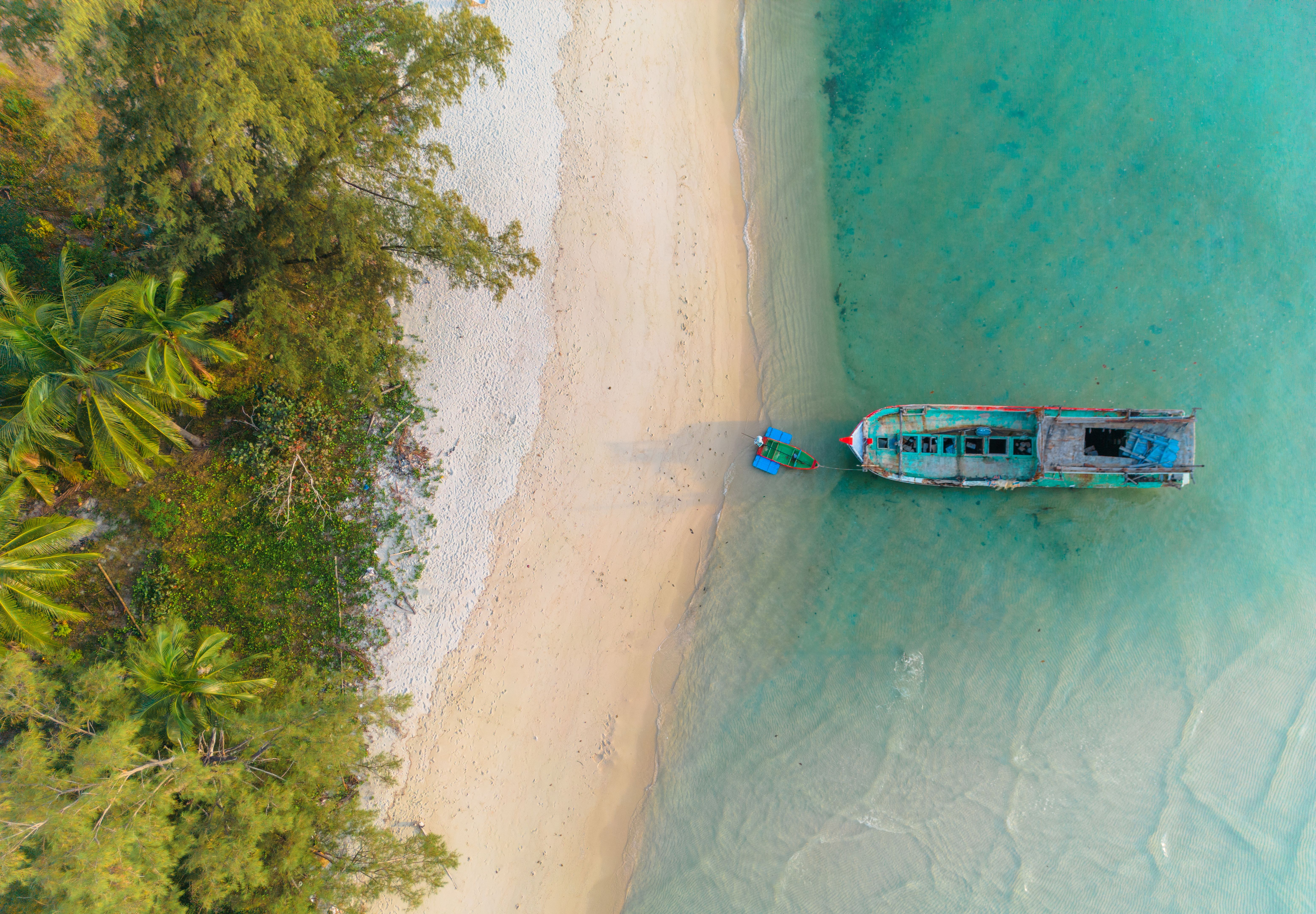 Aerial view of boat near the  idyllic beach on Koh Samui