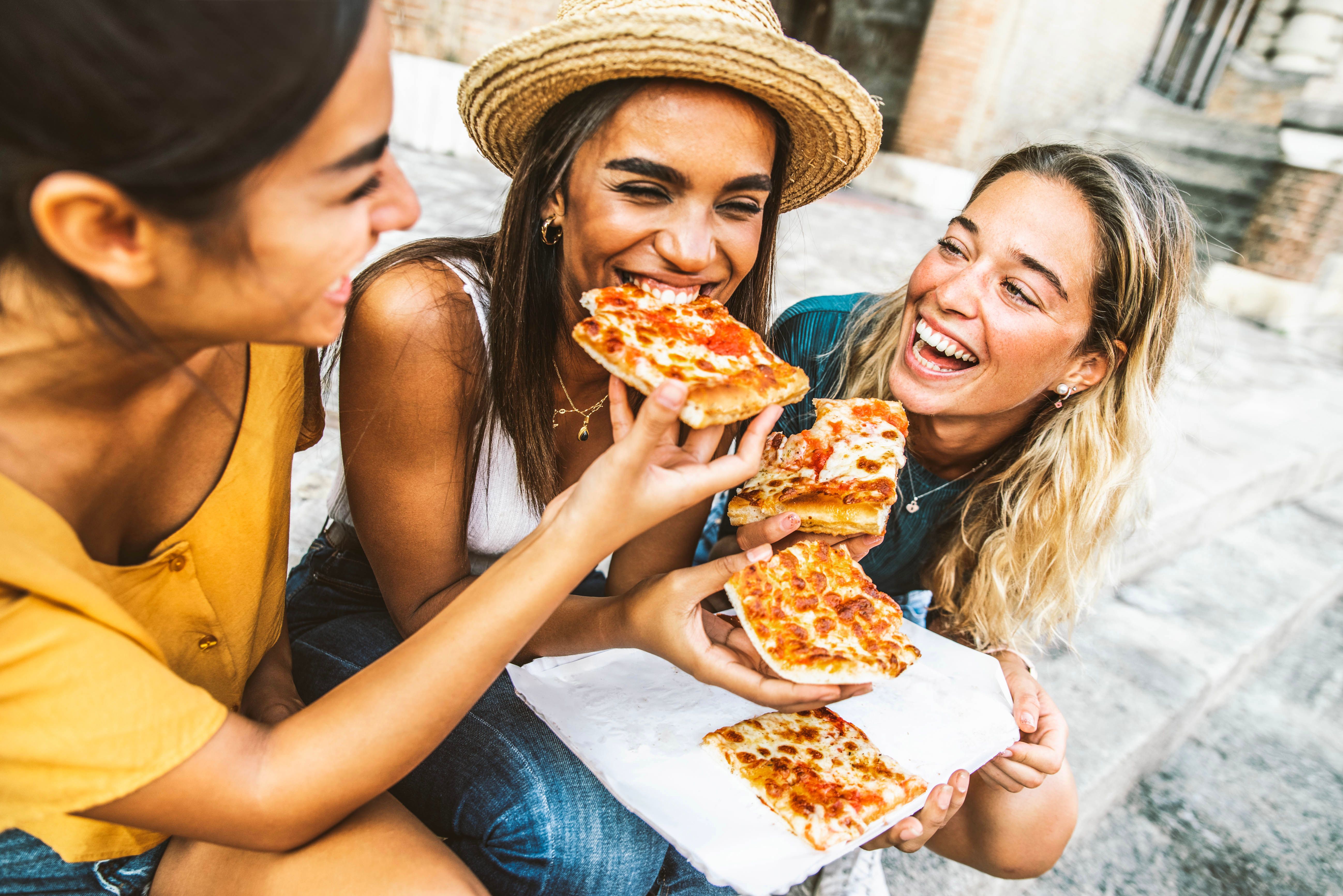 friends enjoying pizza