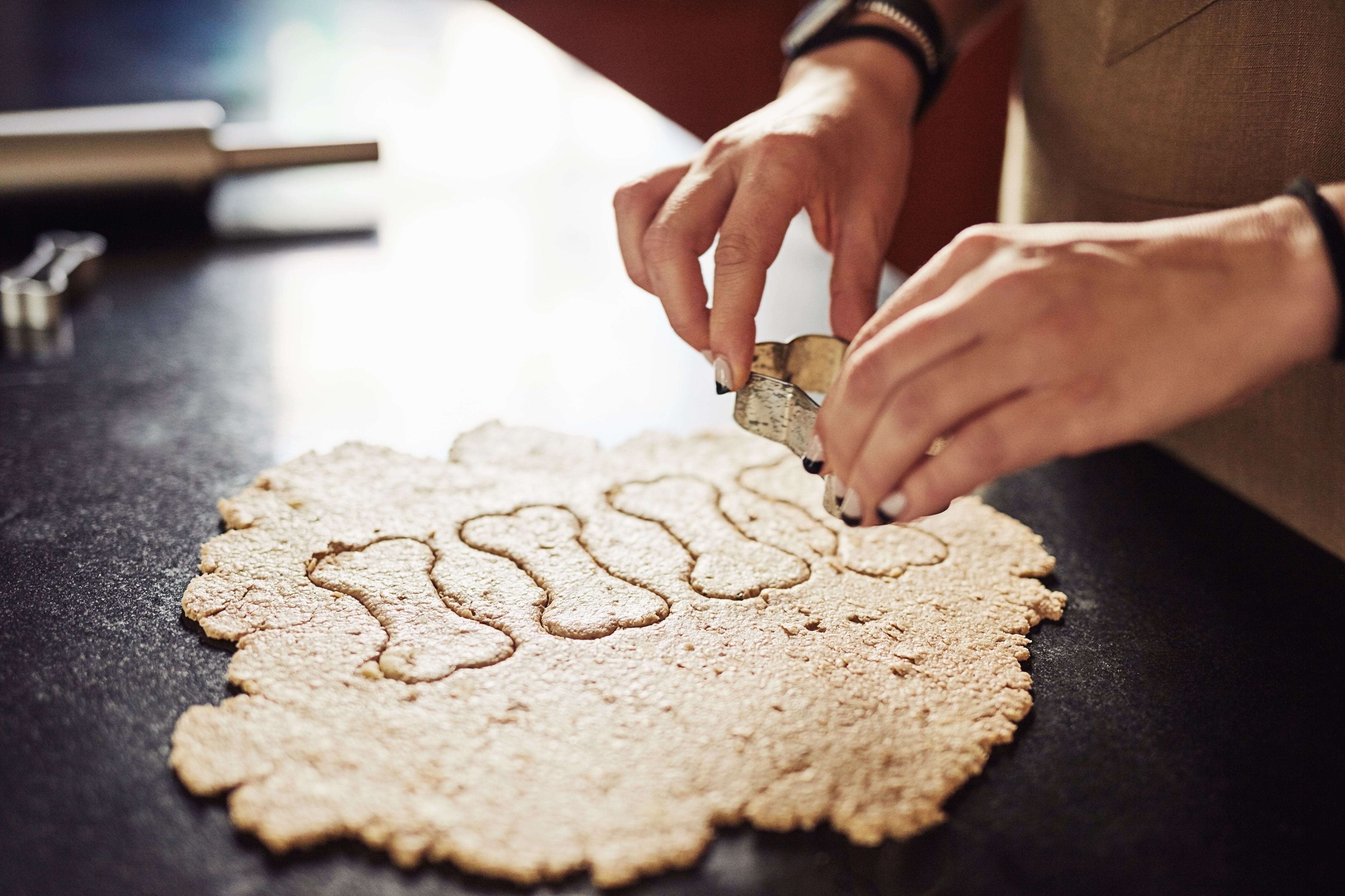 baker making cookies