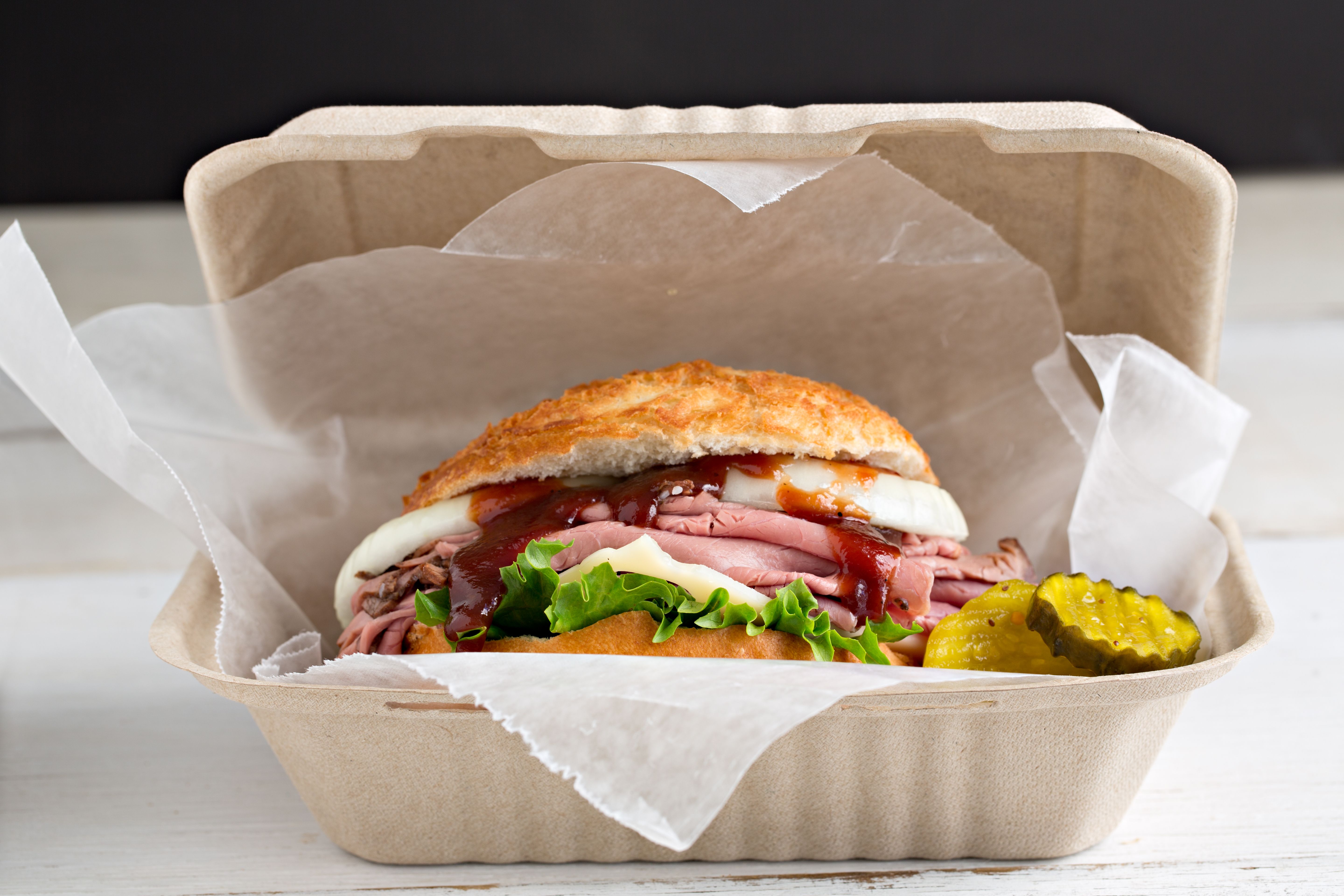 Beef Sandwich packed in an eco friendly compostable To Go hinged box Beef Sandwich packed in an eco friendly compostable To Go hinged box