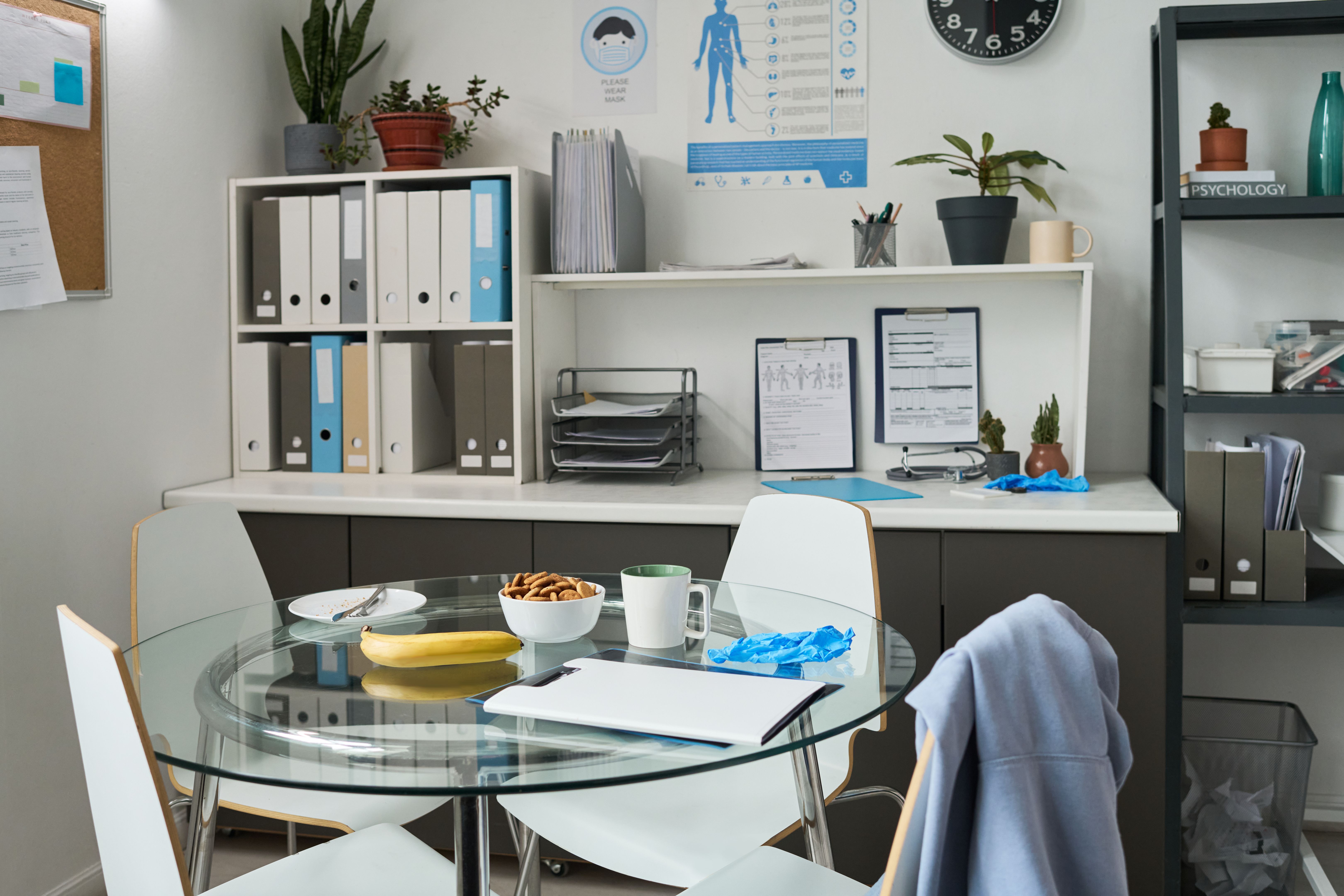 Office Break Room with Health Poster and Supplies