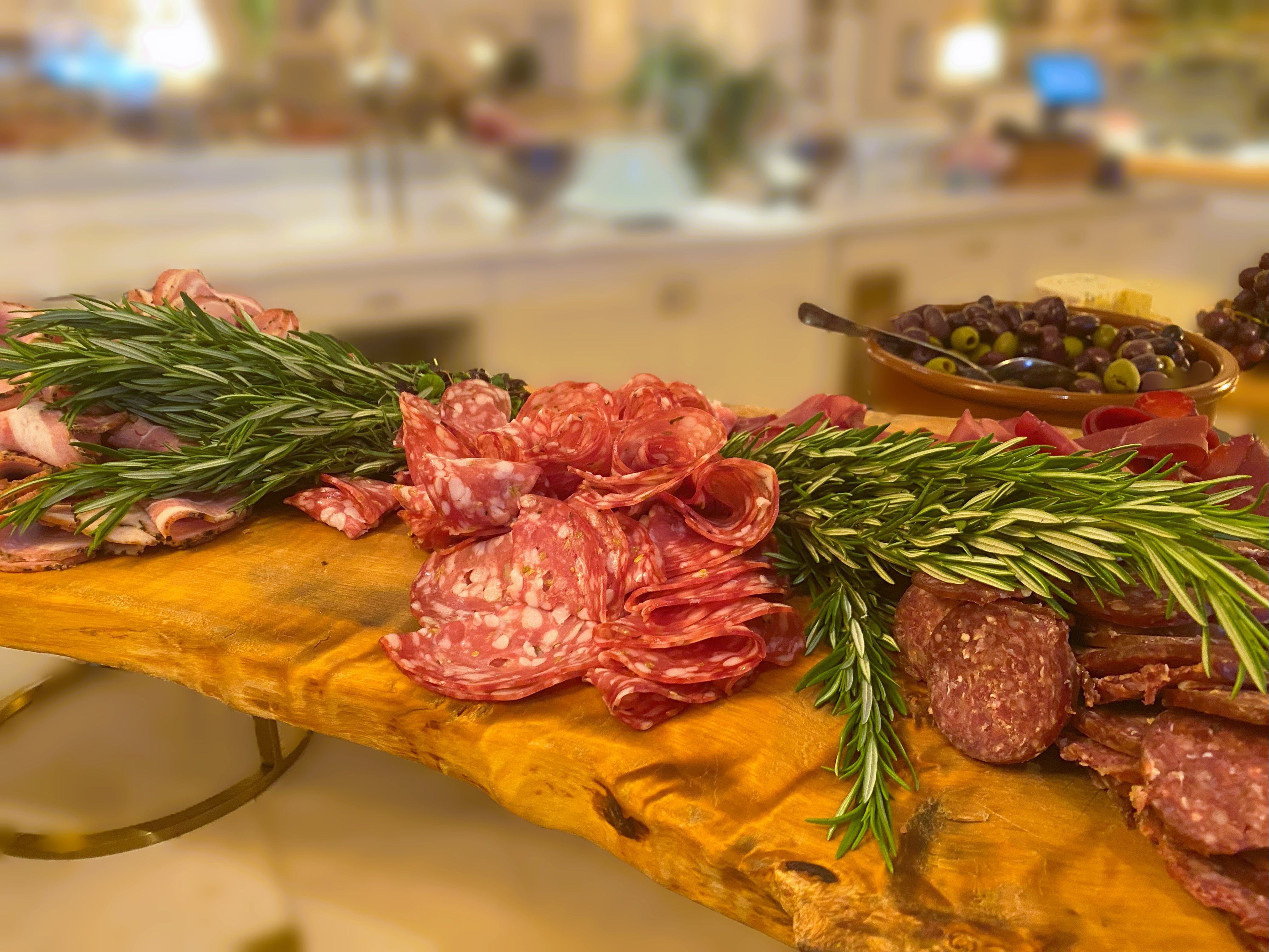 Buffet offering a variety of salami slices