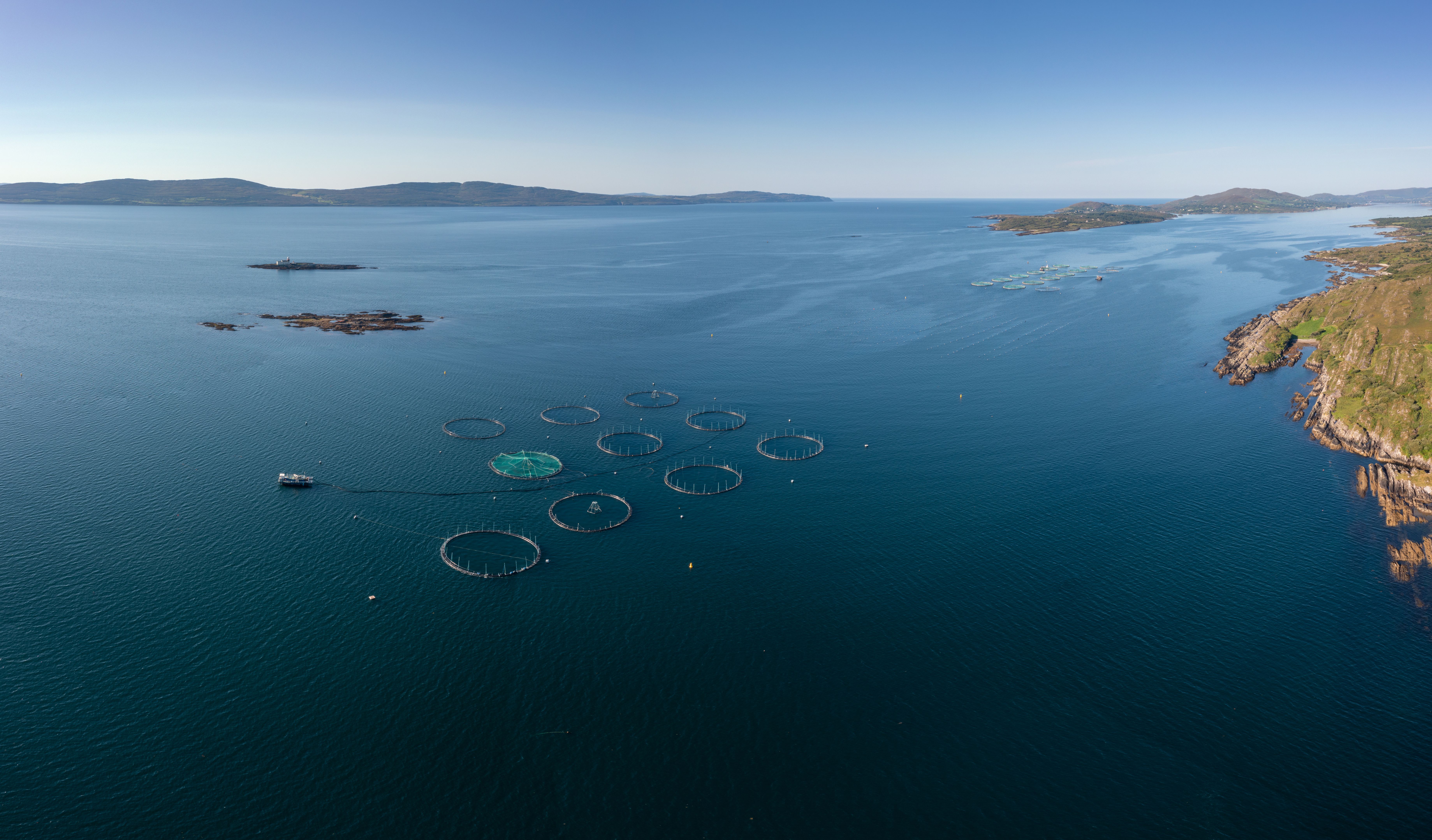 aerial view of a salmon fish farm in Bantry Bay in County Cork of western Ireland