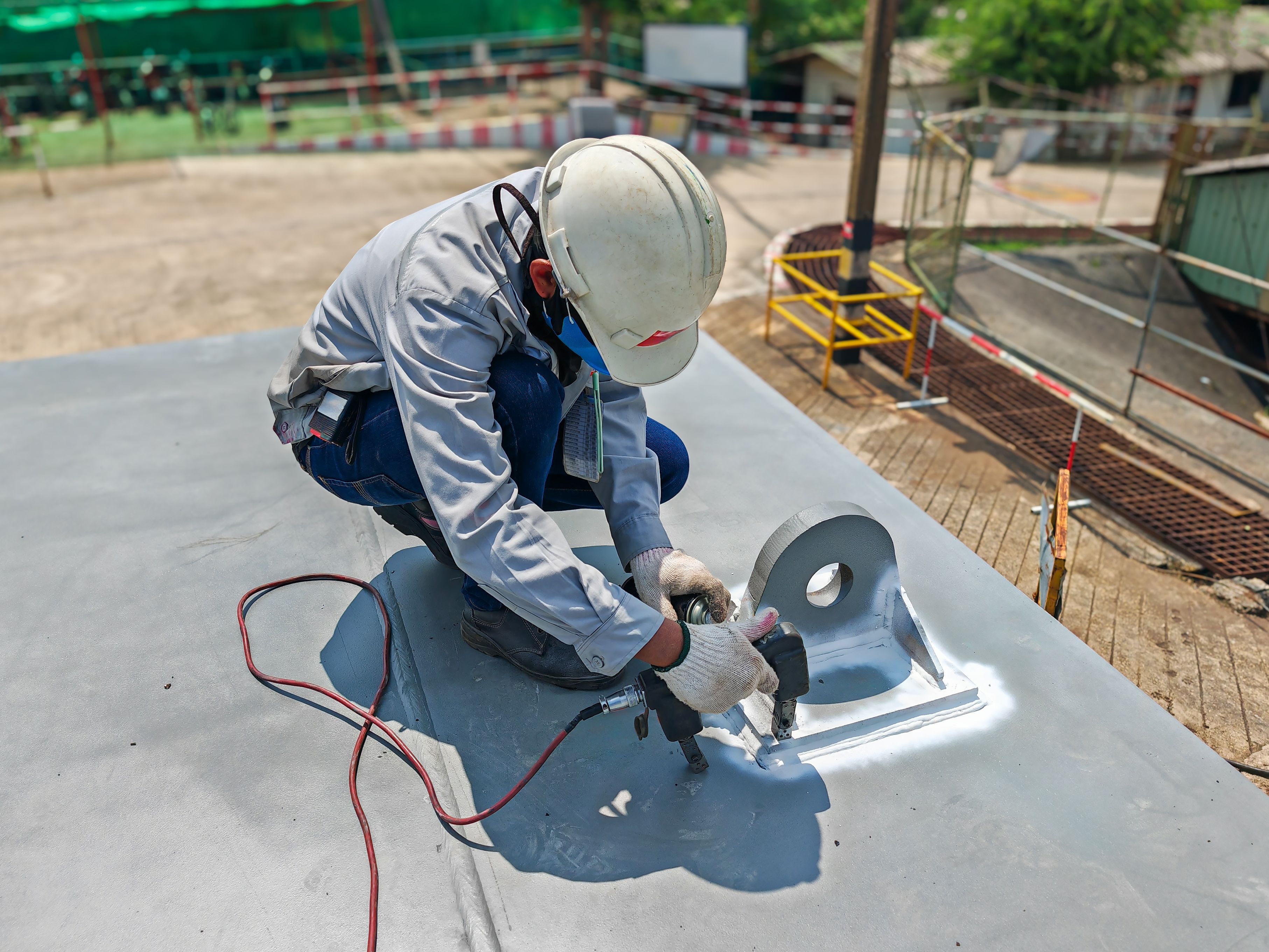 Defects Inspection on Welded Lifting Lug with Process Magnetic Particle Testing(MT) of Non-Destructive Testing(NDT) at an industrial factory.