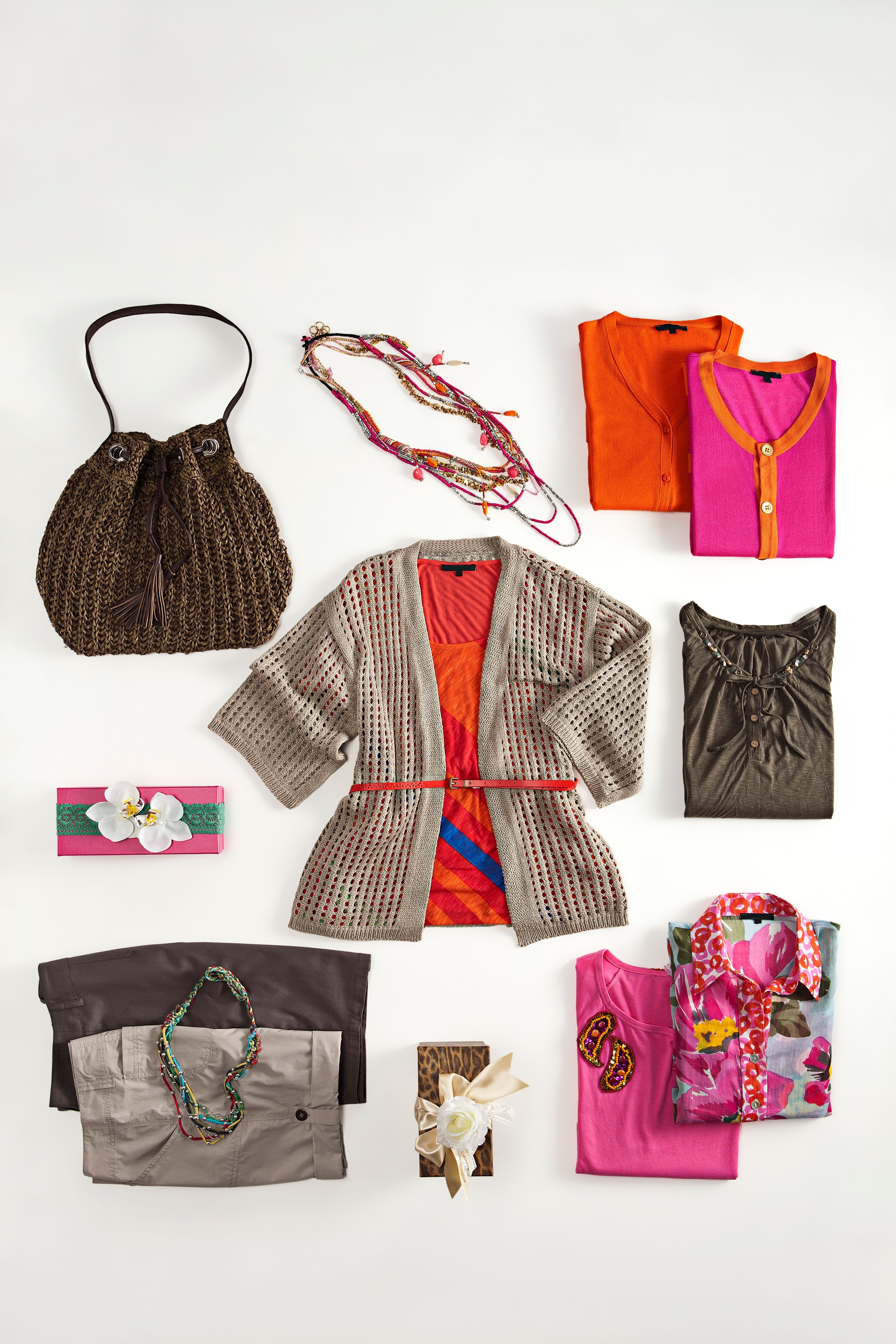 Fashionable women’s clothing with personal accessories on white background Fashionable women’s clothing with personal accessories on white background