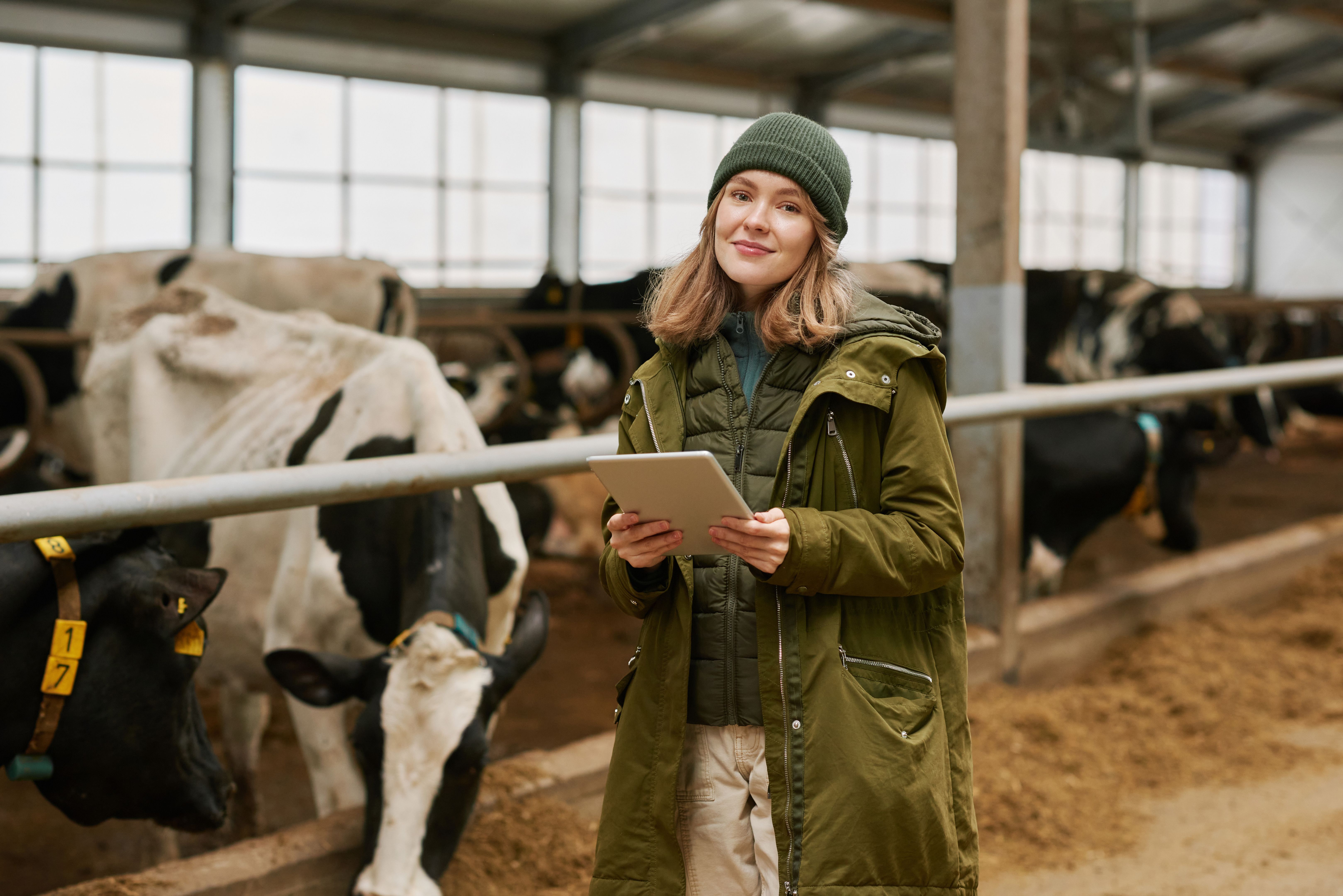 Farmer using tablet pc on farm