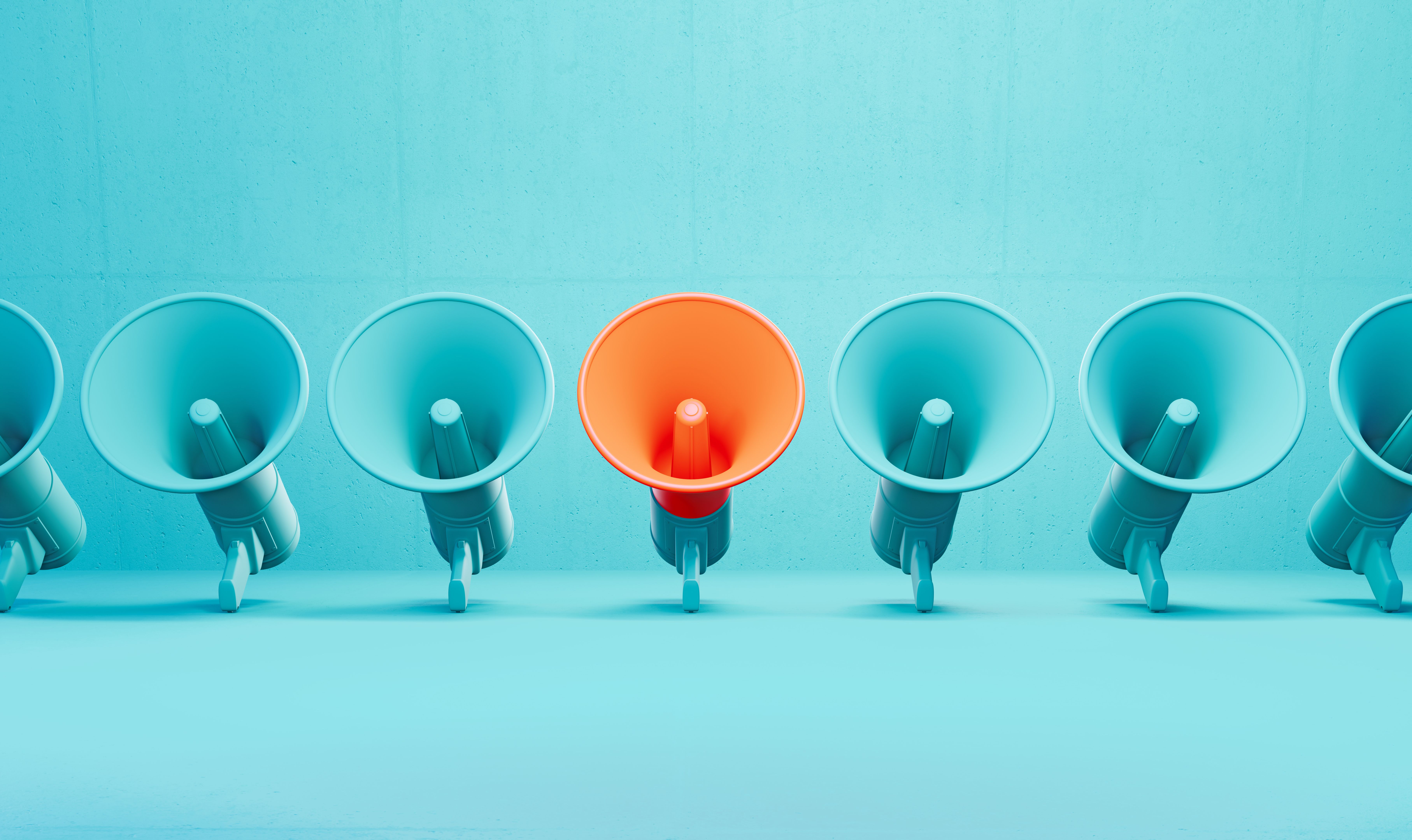 Megaphones Before Blue Background