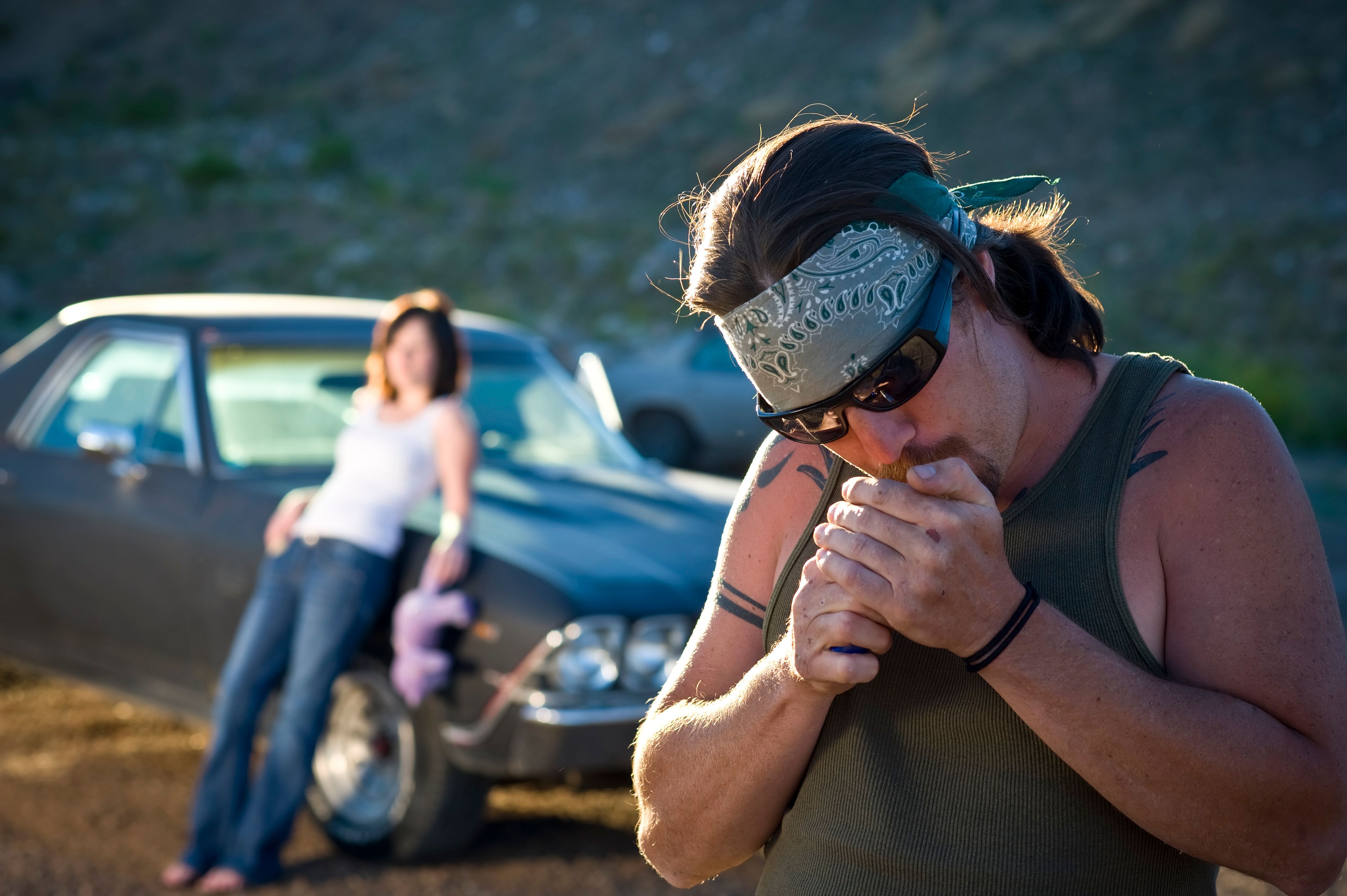 whiskey tango Redneck lights cigarette before girlfriend and car